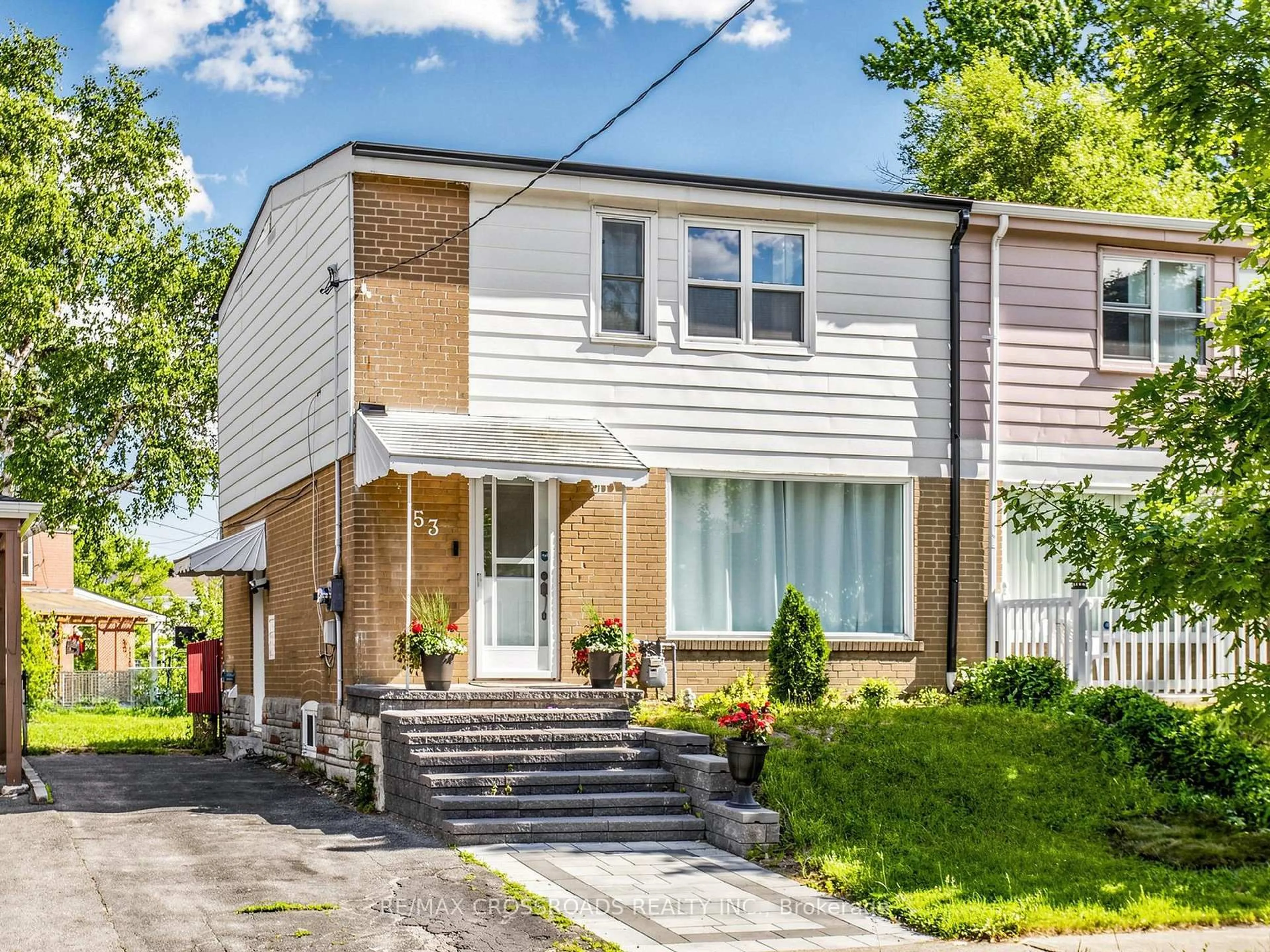 Home with vinyl exterior material, street for 53 Bonniewood Rd, Toronto Ontario M1K 2L9