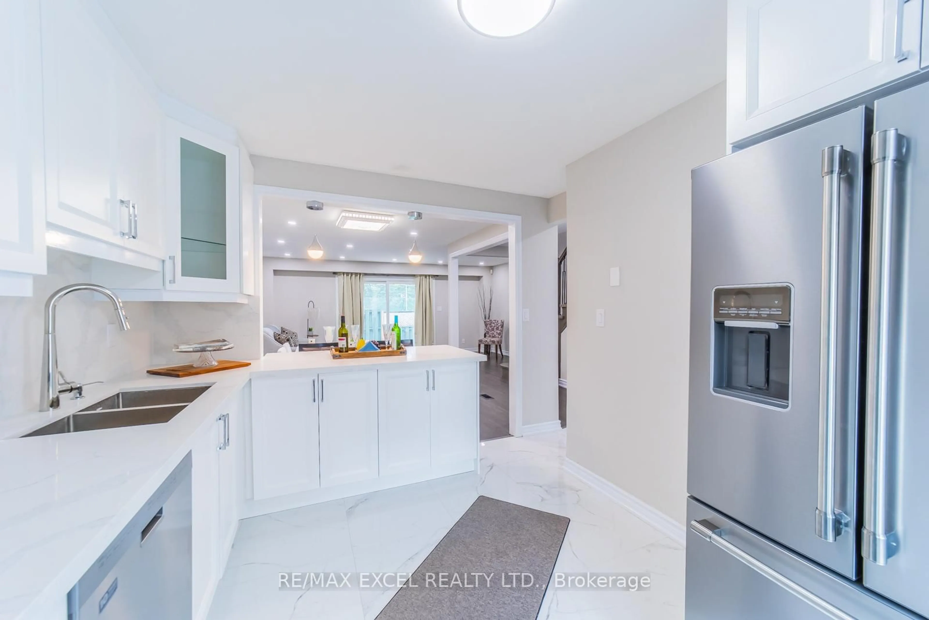 Open concept kitchen, ceramic/tile floor for 21 Livonia Pl #112, Toronto Ontario M1E 4W5