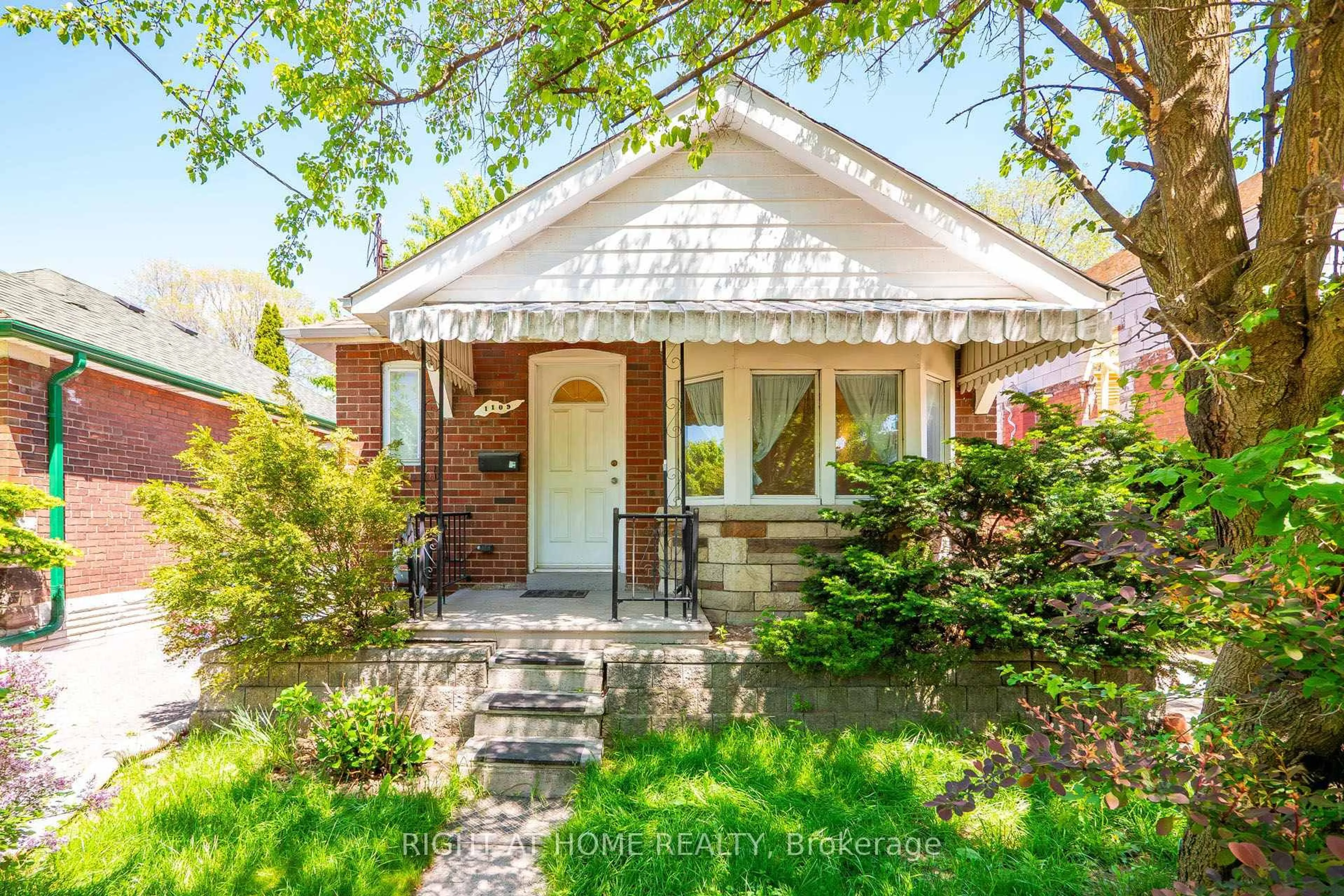 Home with brick exterior material, street for 1109 Greenwood Ave, Toronto Ontario M4J 4E5