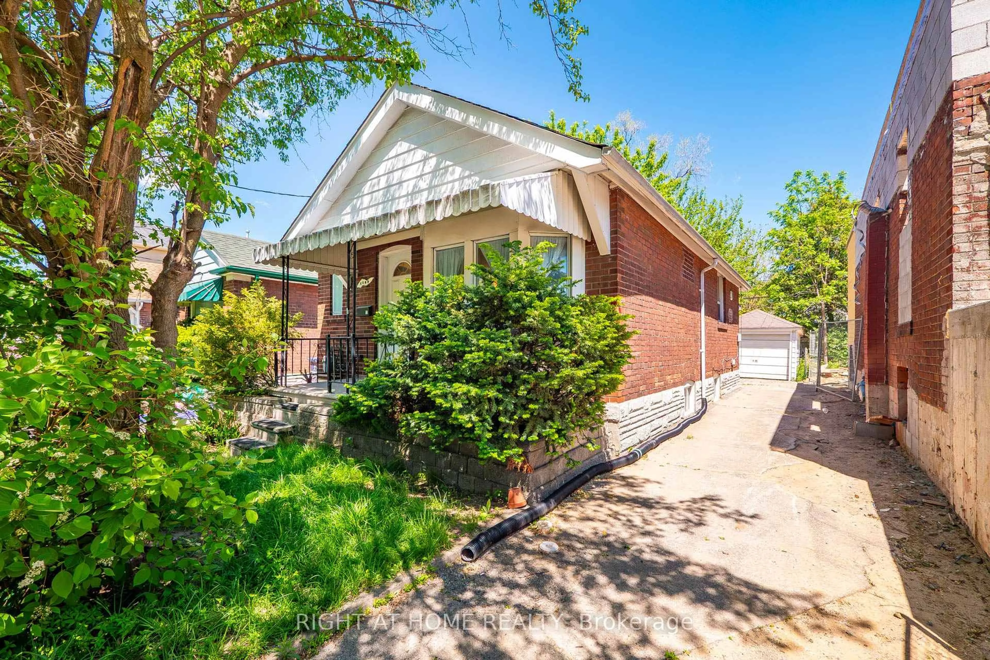 Home with brick exterior material, street for 1109 Greenwood Ave, Toronto Ontario M4J 4E5