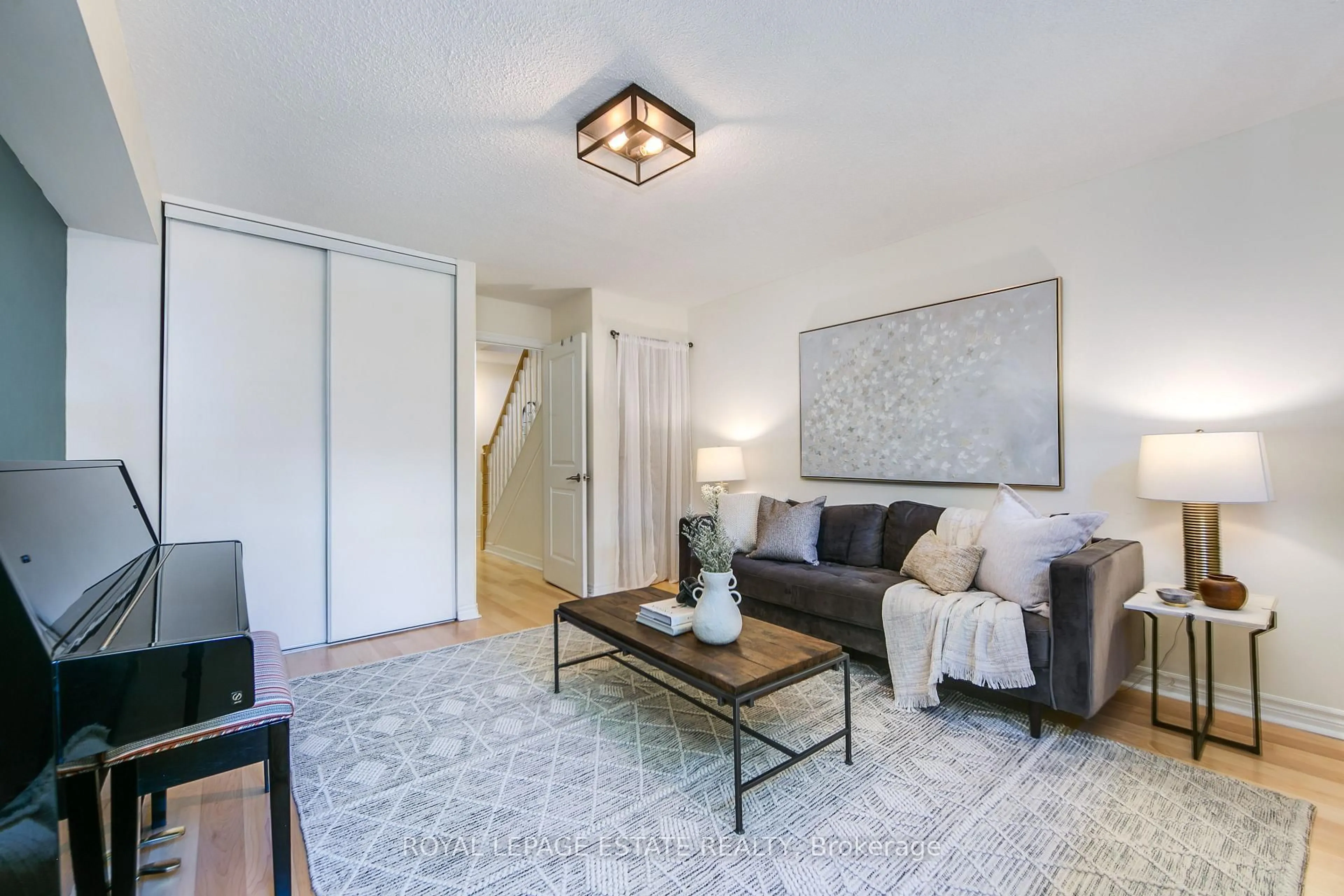 Living room with furniture, unknown for 1209 Queen St #72, Toronto Ontario M4M 3H4
