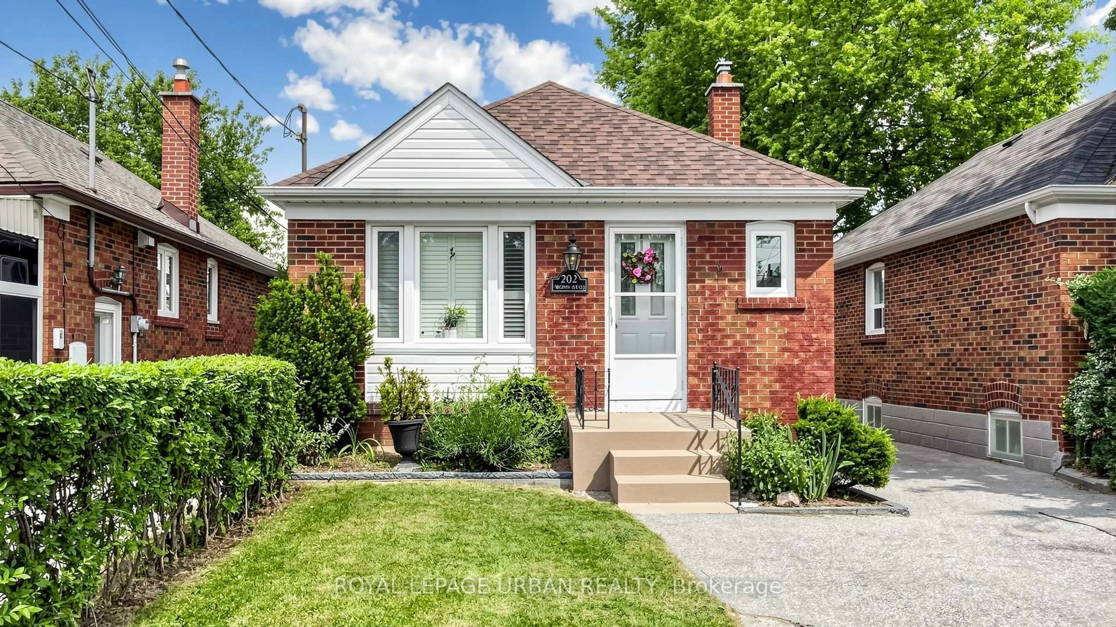 Home with brick exterior material, street for 202 Virginia Ave, Toronto Ontario M4C 2T7