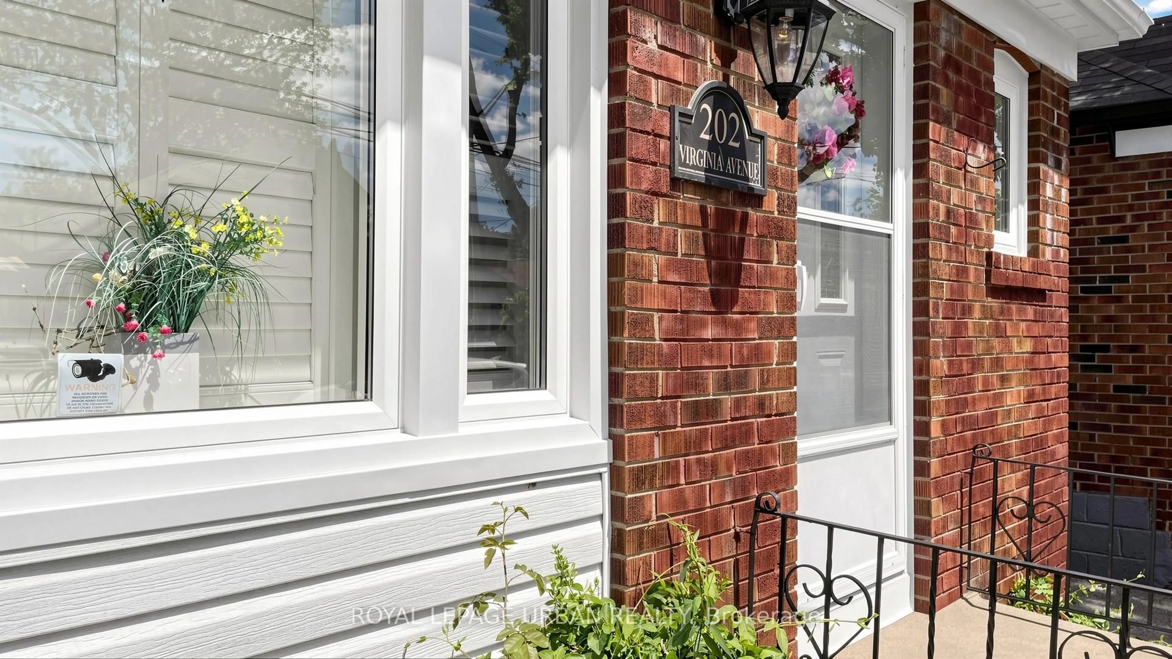 Home with brick exterior material, street for 202 Virginia Ave, Toronto Ontario M4C 2T7