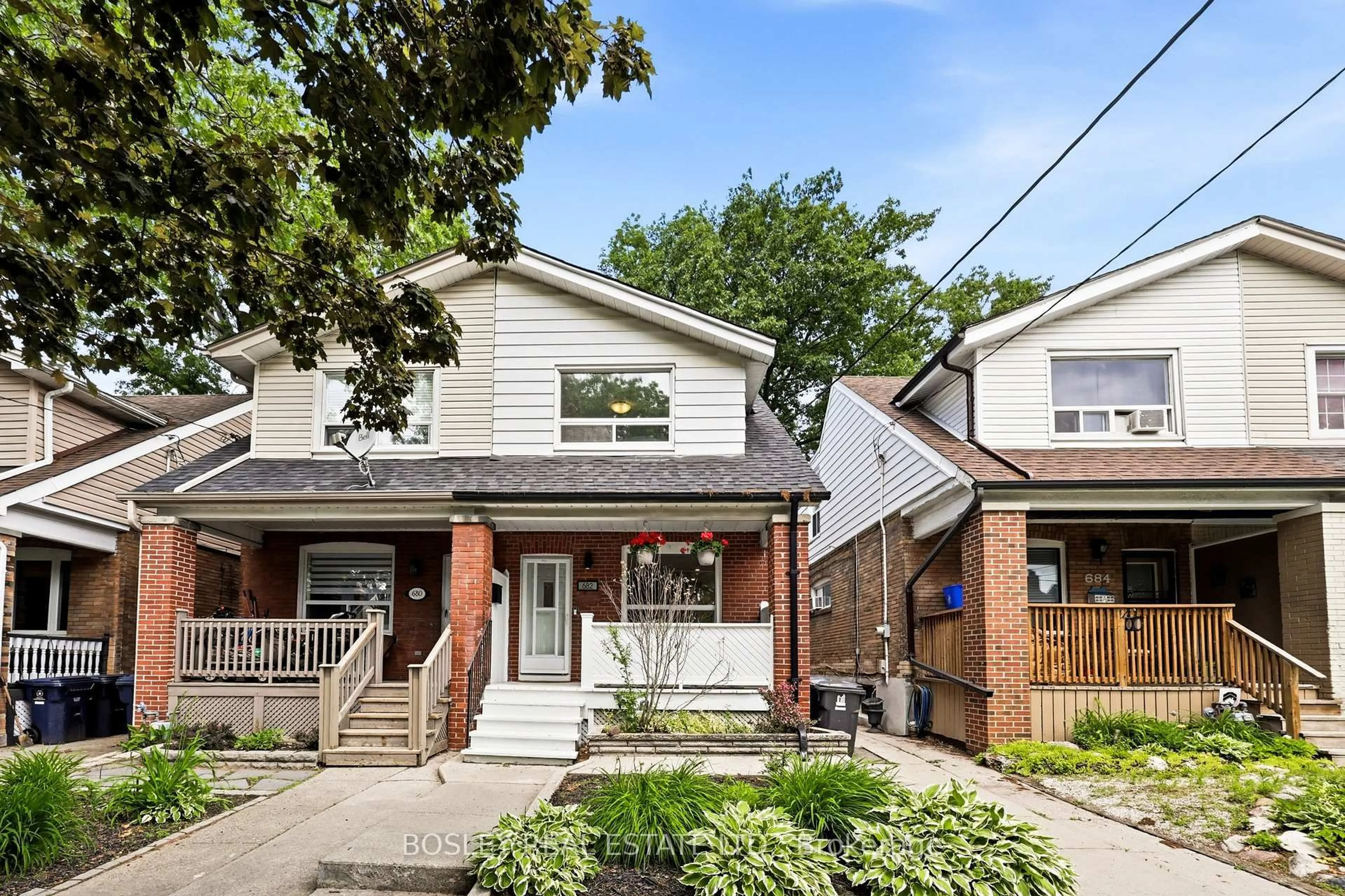 Home with brick exterior material, street for 682 Milverton Blvd, Toronto Ontario M4C 1X9