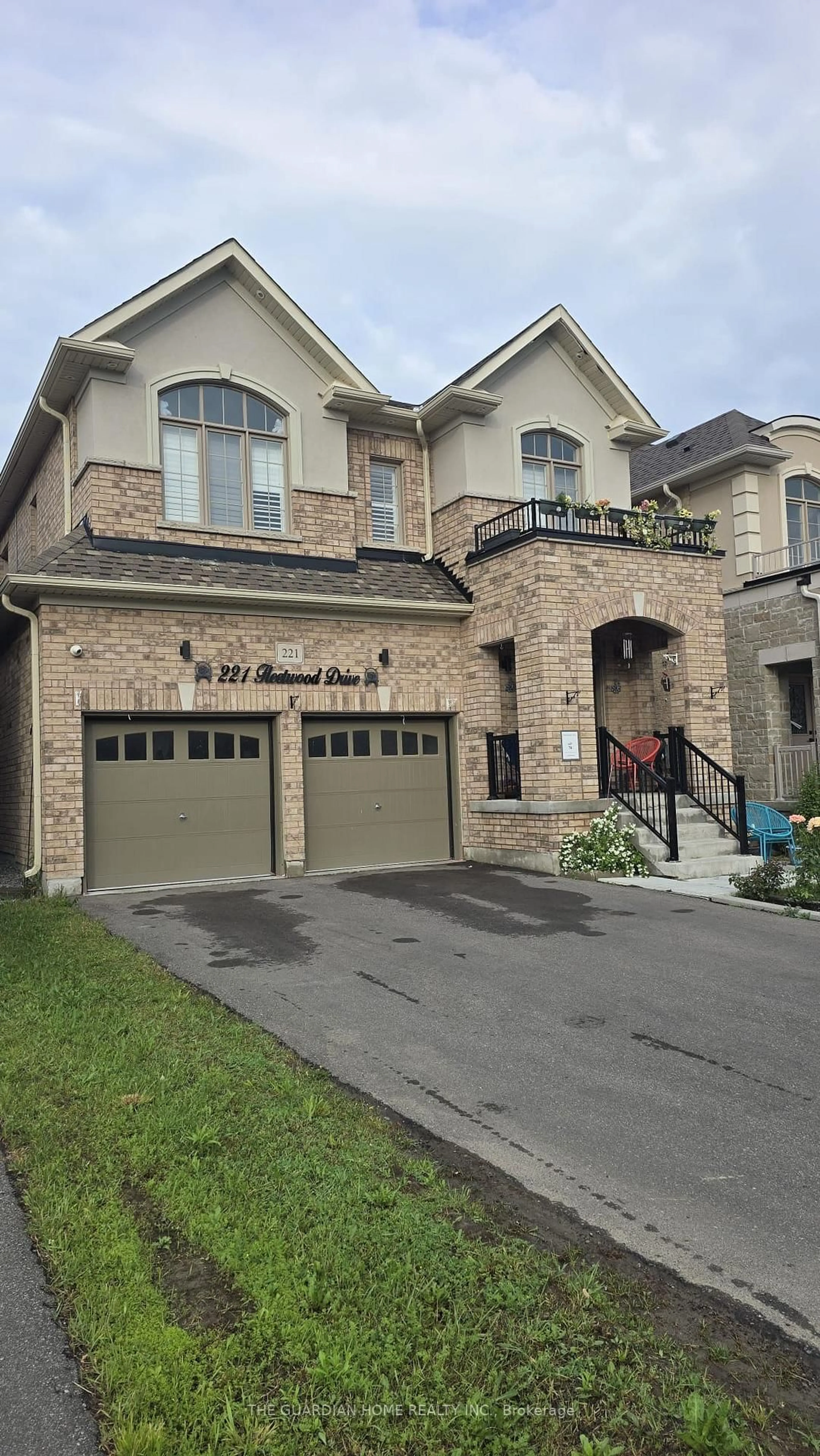 Home with brick exterior material, street for 221 Fleetwood Dr, Oshawa Ontario L1K 3E7