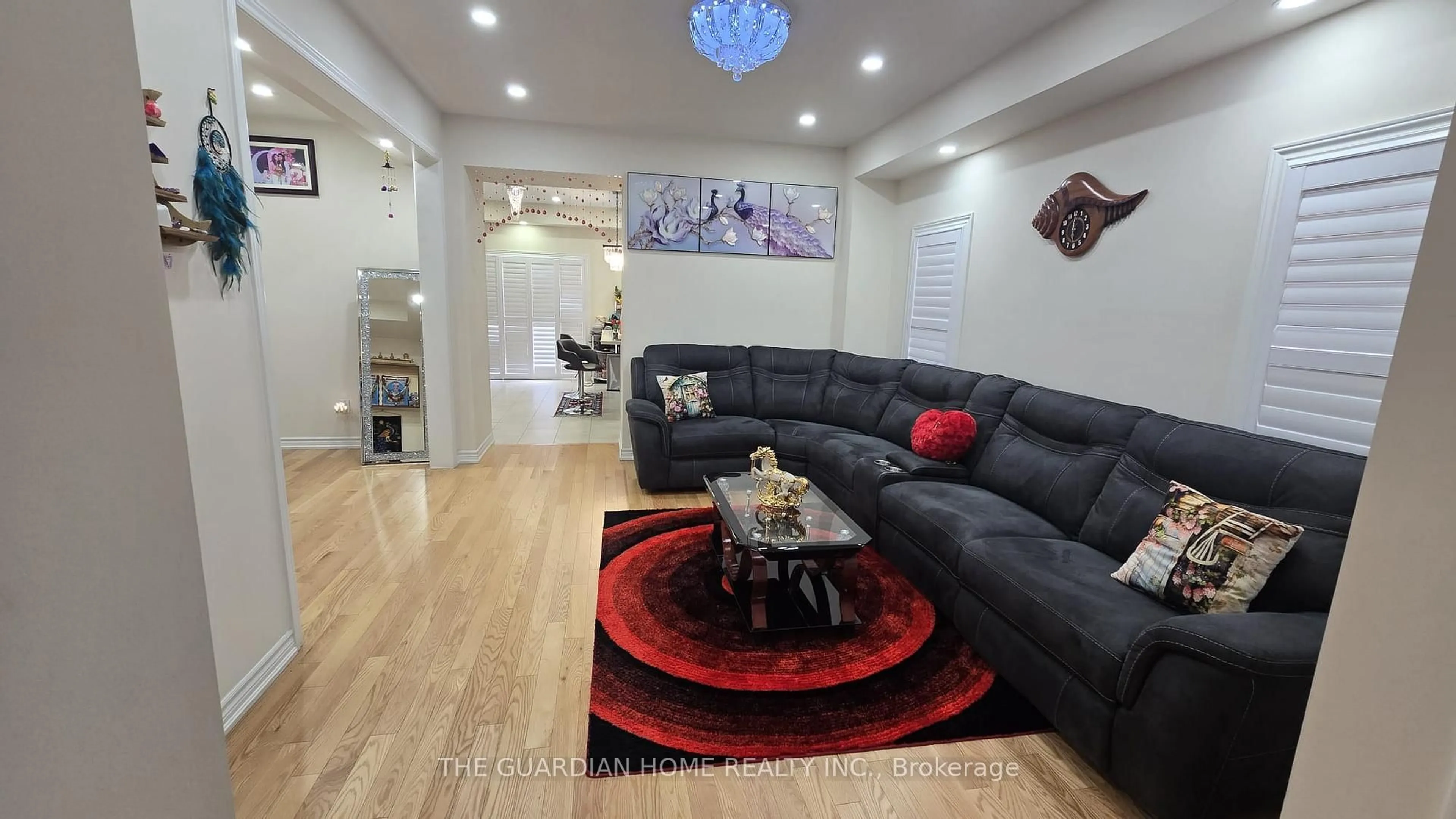 Living room with furniture, wood/laminate floor for 221 Fleetwood Dr, Oshawa Ontario L1K 3E7