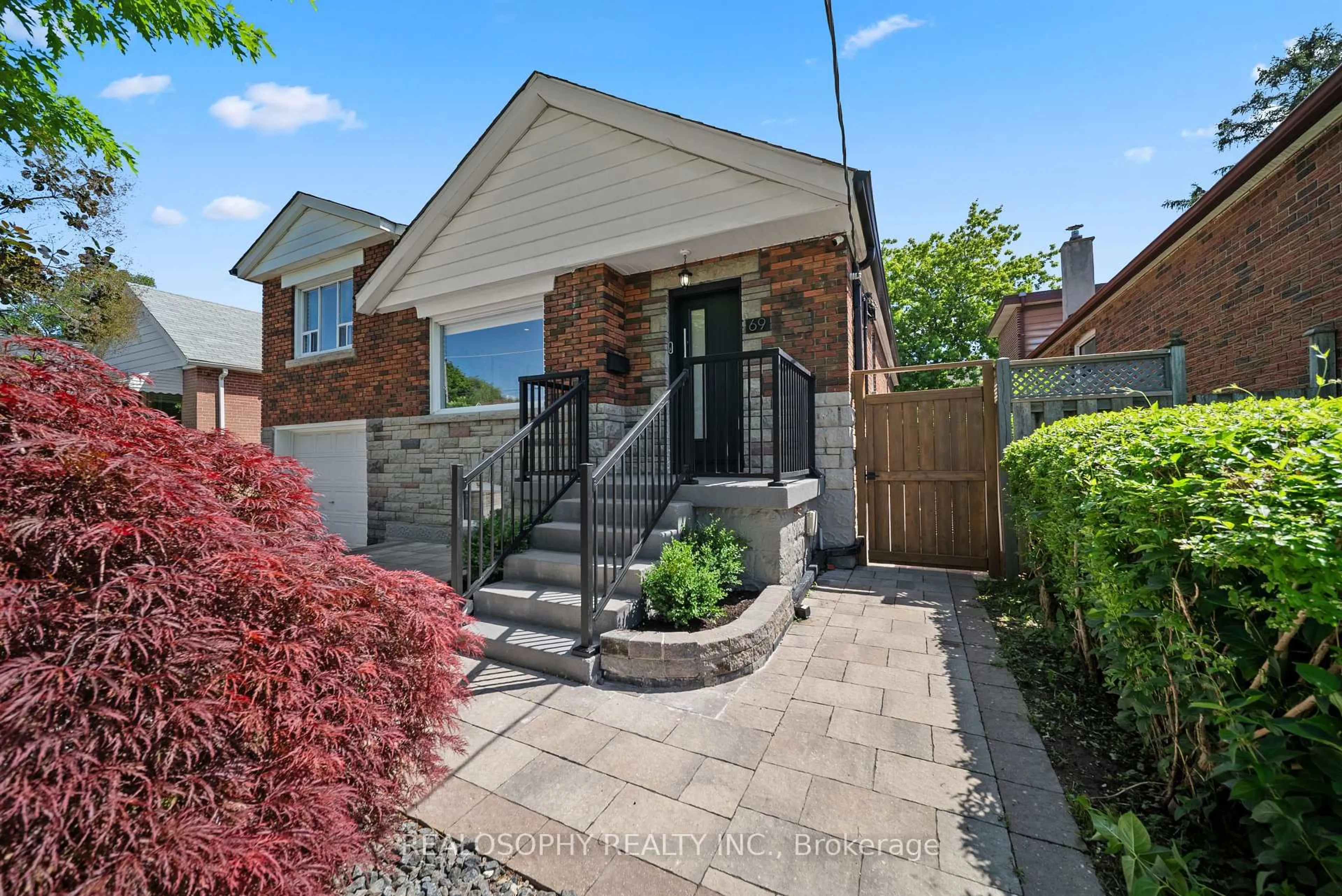 Home with brick exterior material, street for 69 Squires Ave, Toronto Ontario M4B 2R7