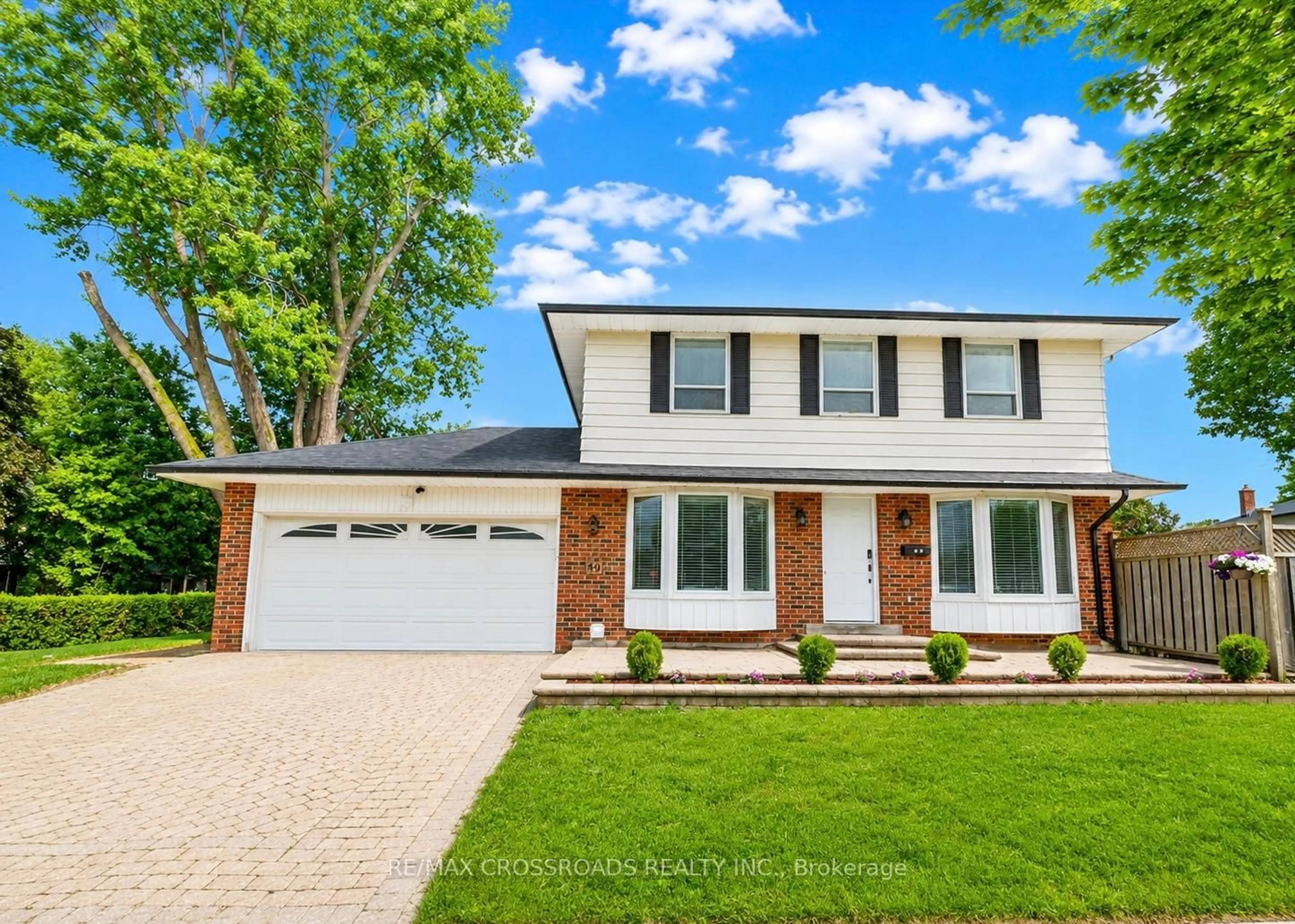 Home with brick exterior material, street for 49 King Louis Cres, Toronto Ontario M1T 2X1