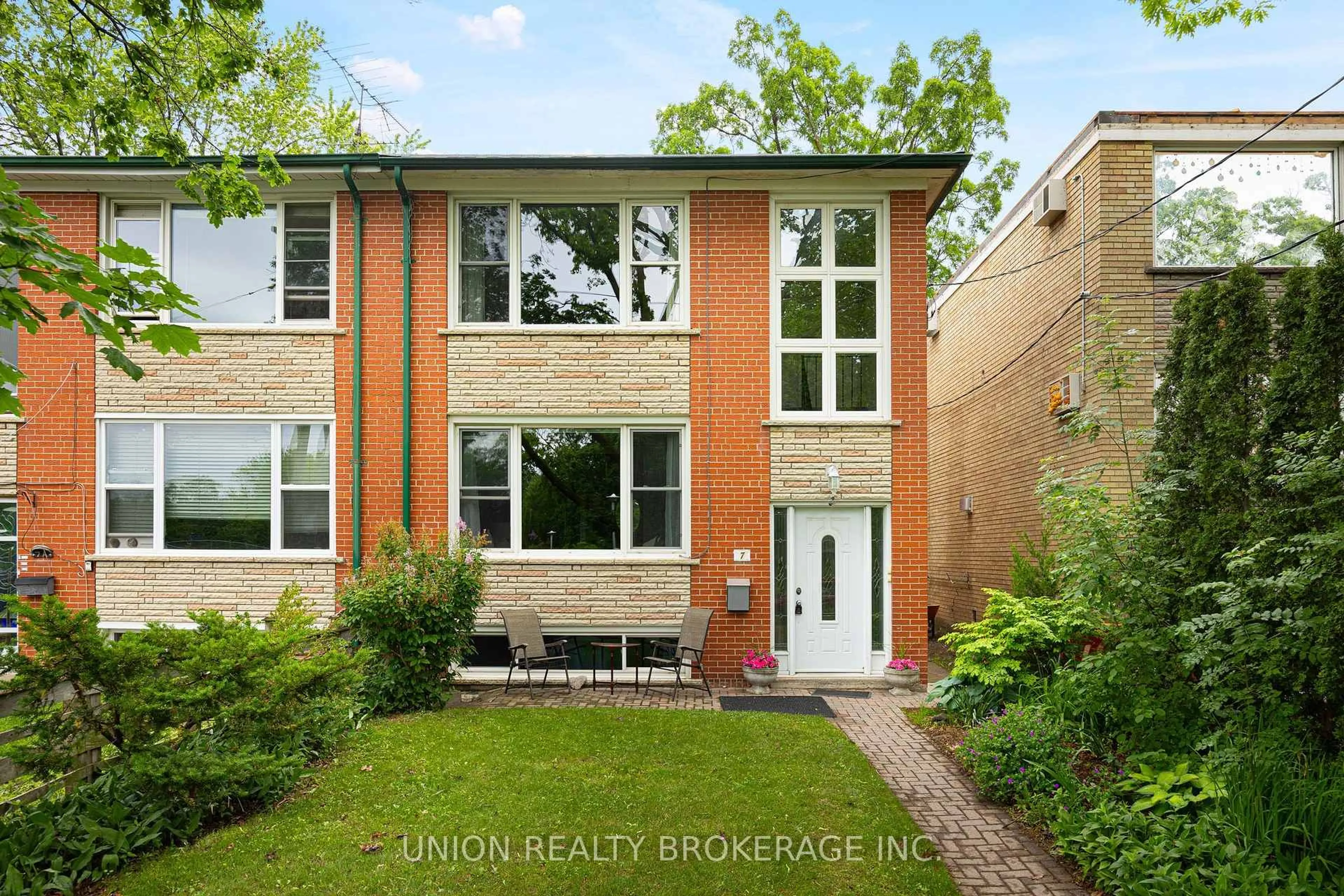 Home with brick exterior material, street for 7 Norwood Rd, Toronto Ontario M4E 2R9