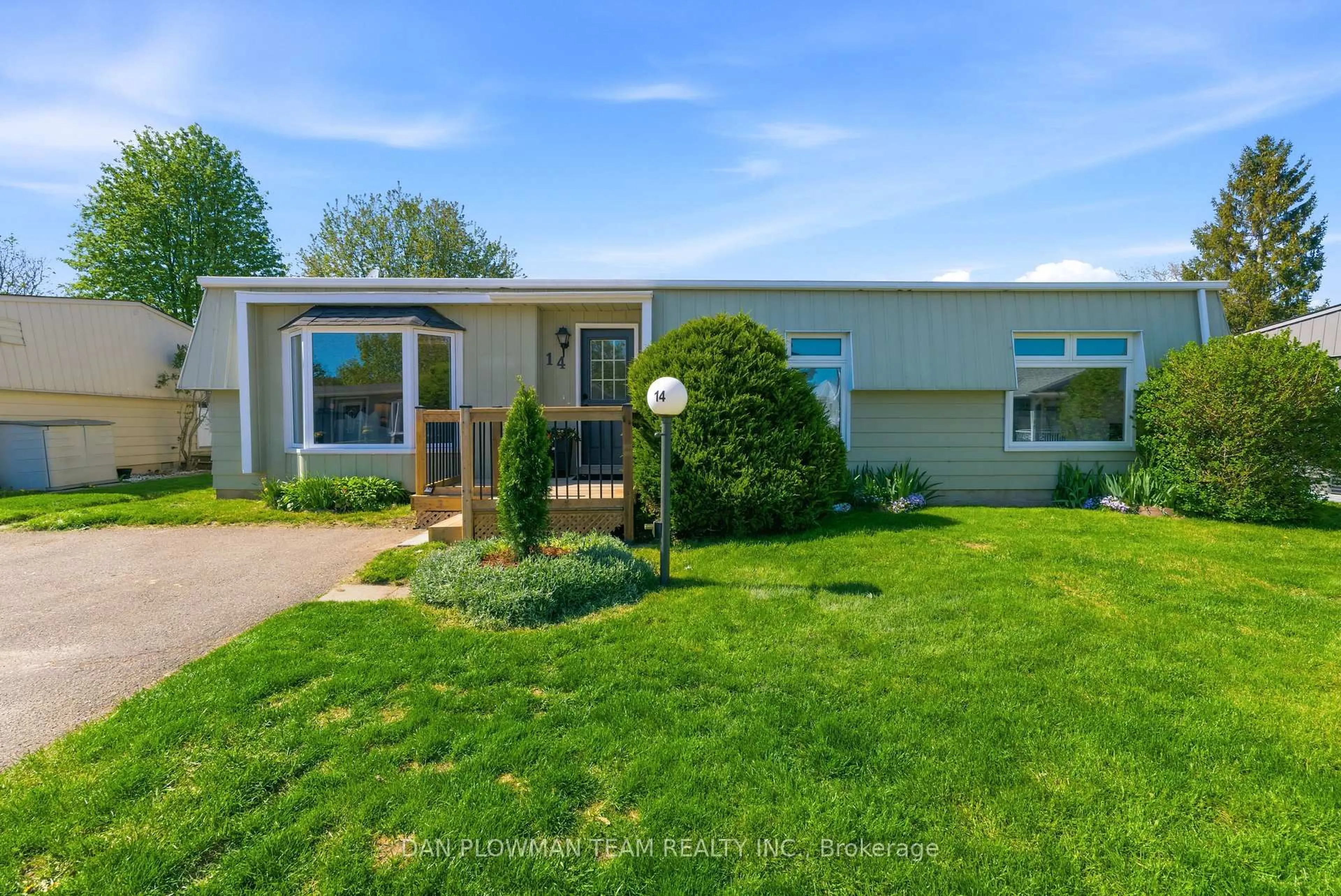 Home with vinyl exterior material, street for 14 Heritage Lane, Clarington Ontario L1B 1A7