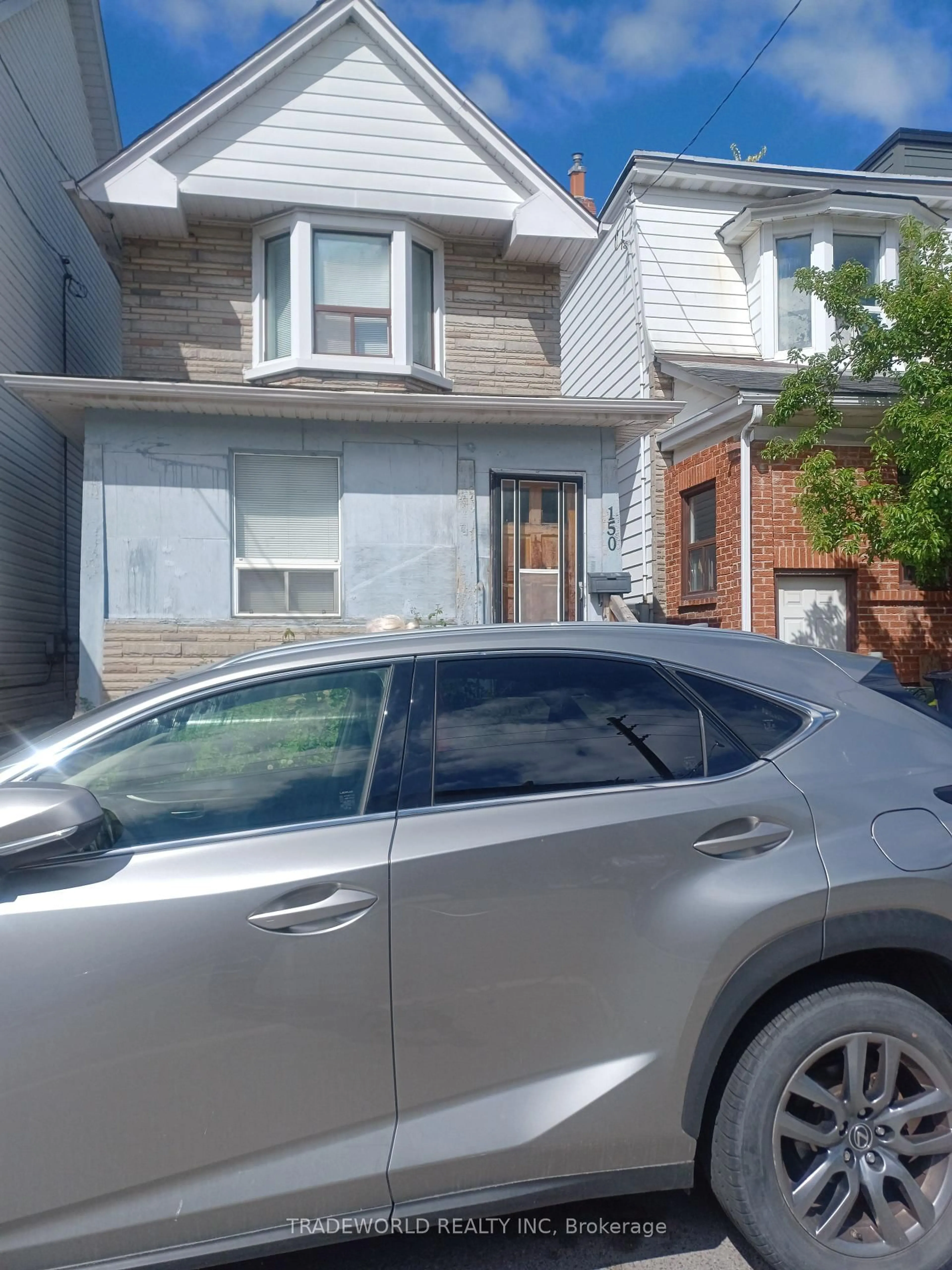Home with vinyl exterior material, street for 150 Jones Ave, Toronto Ontario M4M 3A3