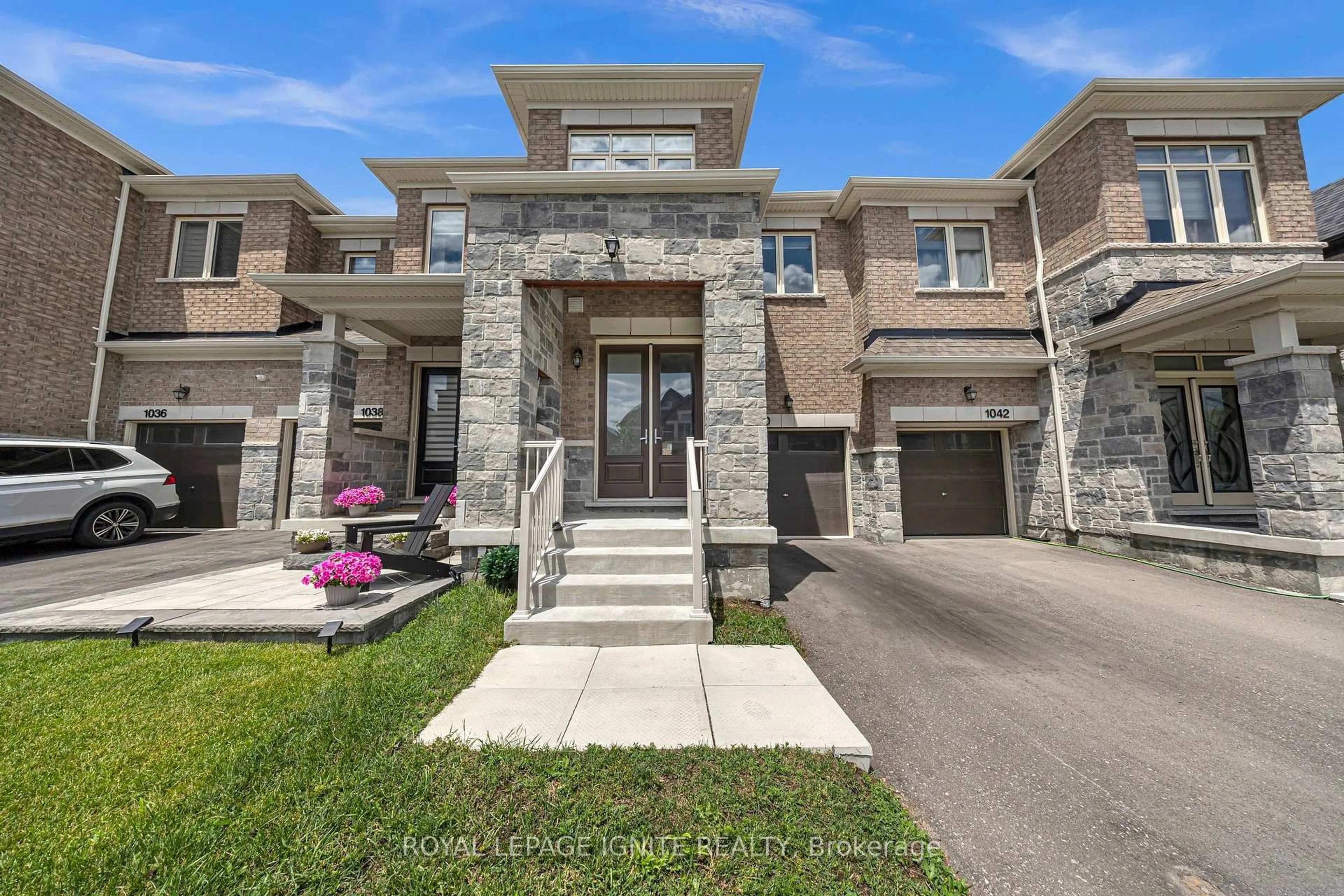 Home with brick exterior material, street for 1040 Skyridge Blvd, Pickering Ontario L1X 0G5