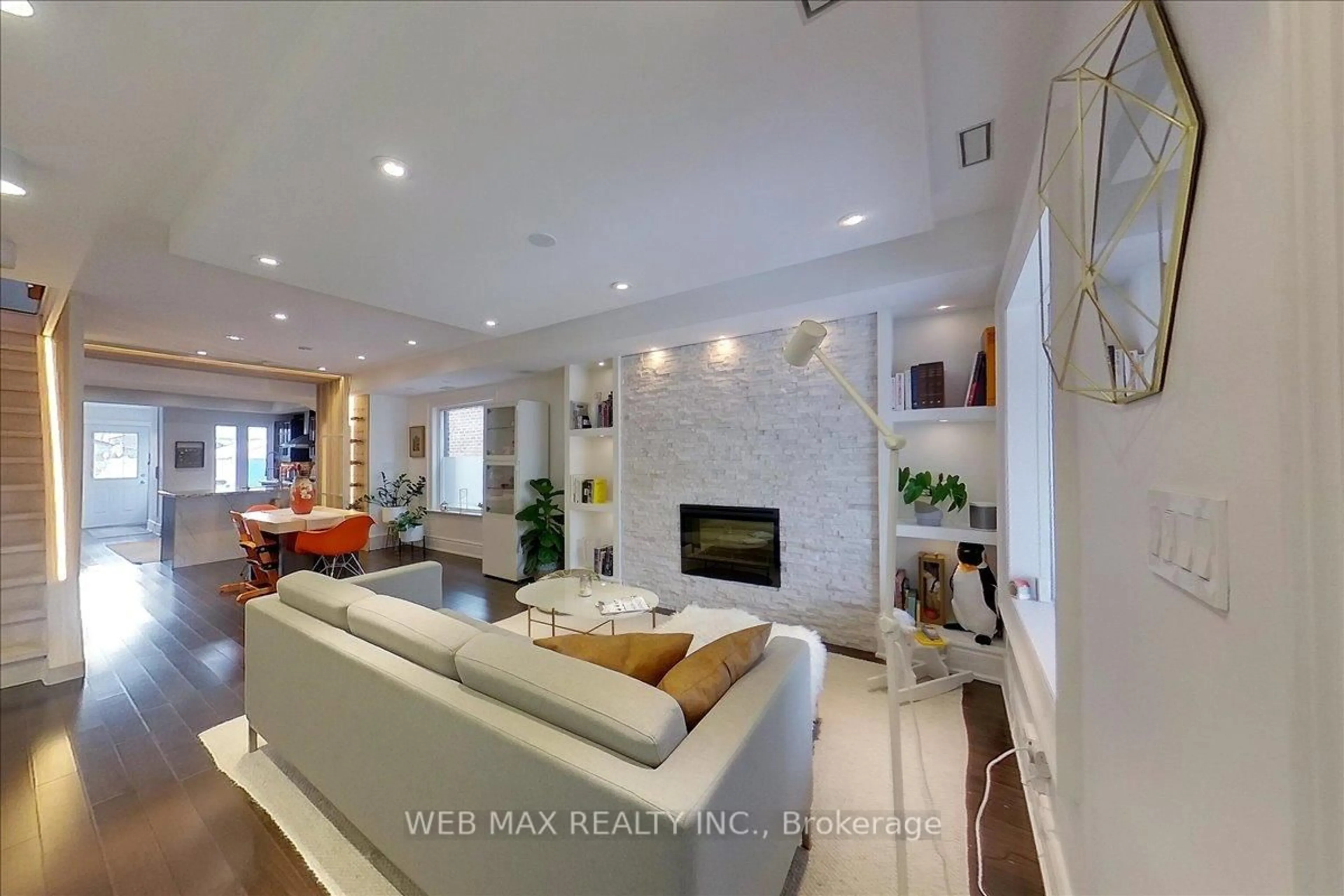 Living room with furniture, ceramic/tile floor for 173 Milverton Blvd, Toronto Ontario M4J 1V2