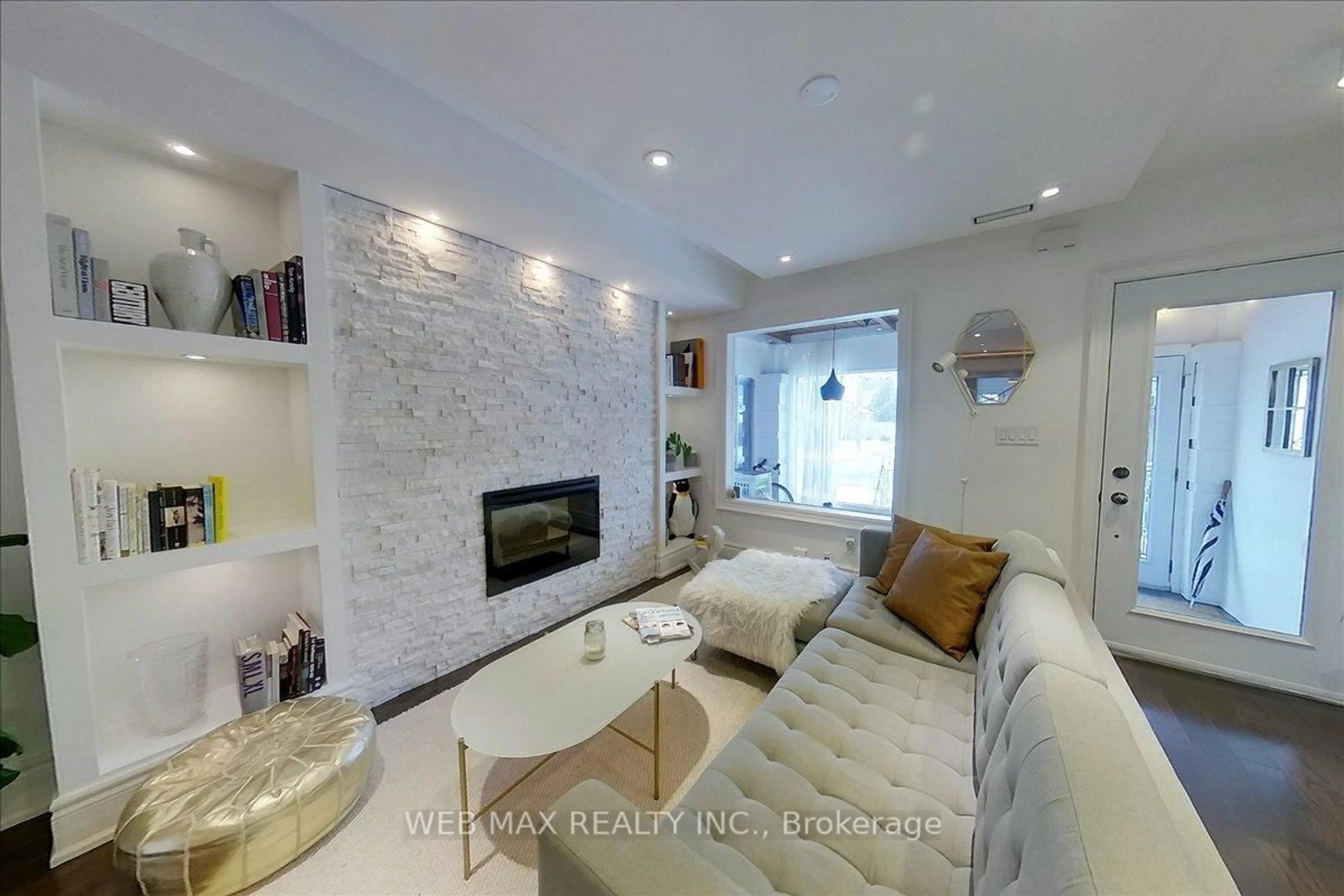 Living room with furniture, ceramic/tile floor for 173 Milverton Blvd, Toronto Ontario M4J 1V2