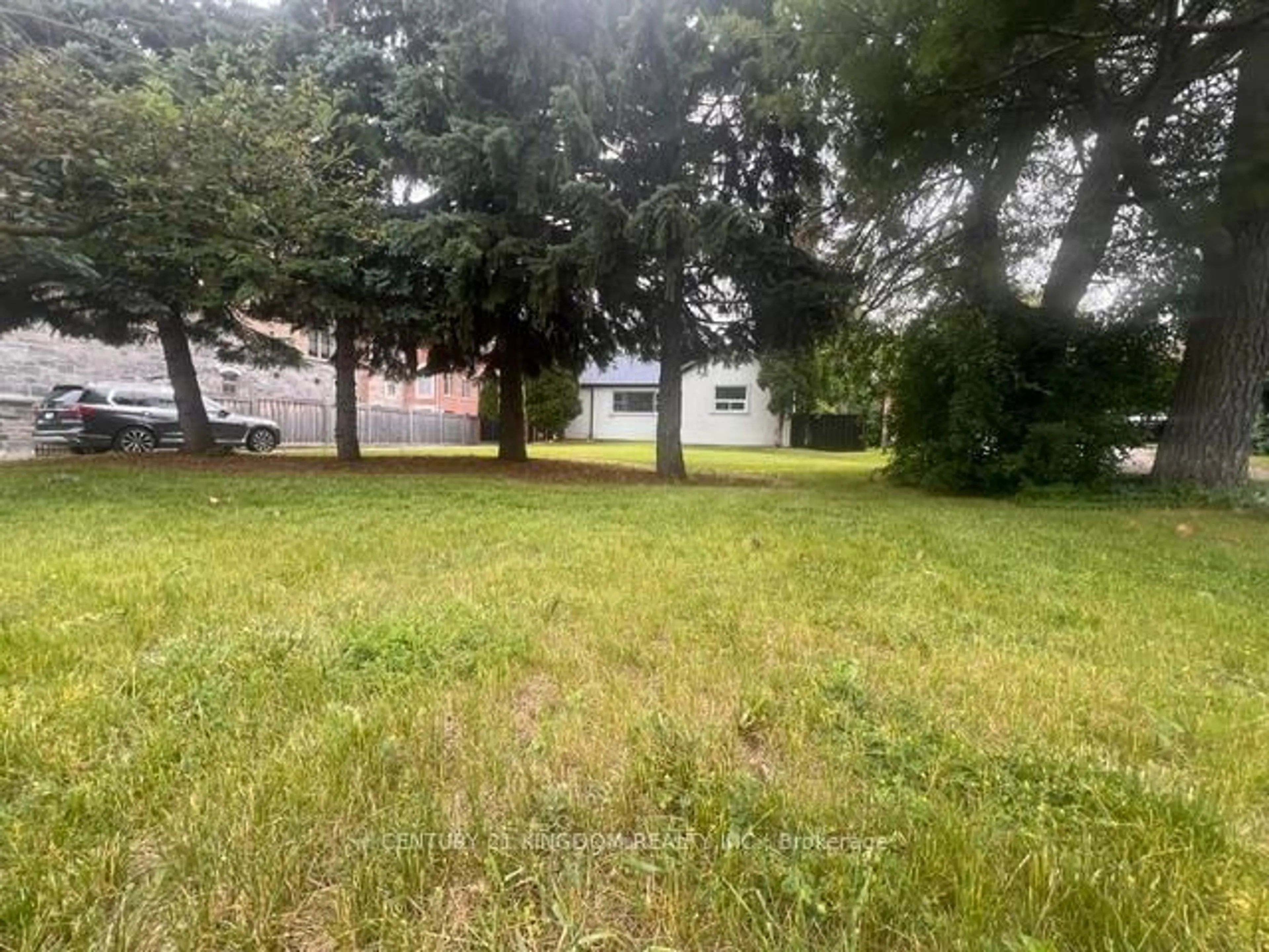 A pic from outside/outdoor area/front of a property/back of a property/a pic from drone, forest/trees view for 132 Old Harwood Ave, Ajax Ontario L1T 4W4
