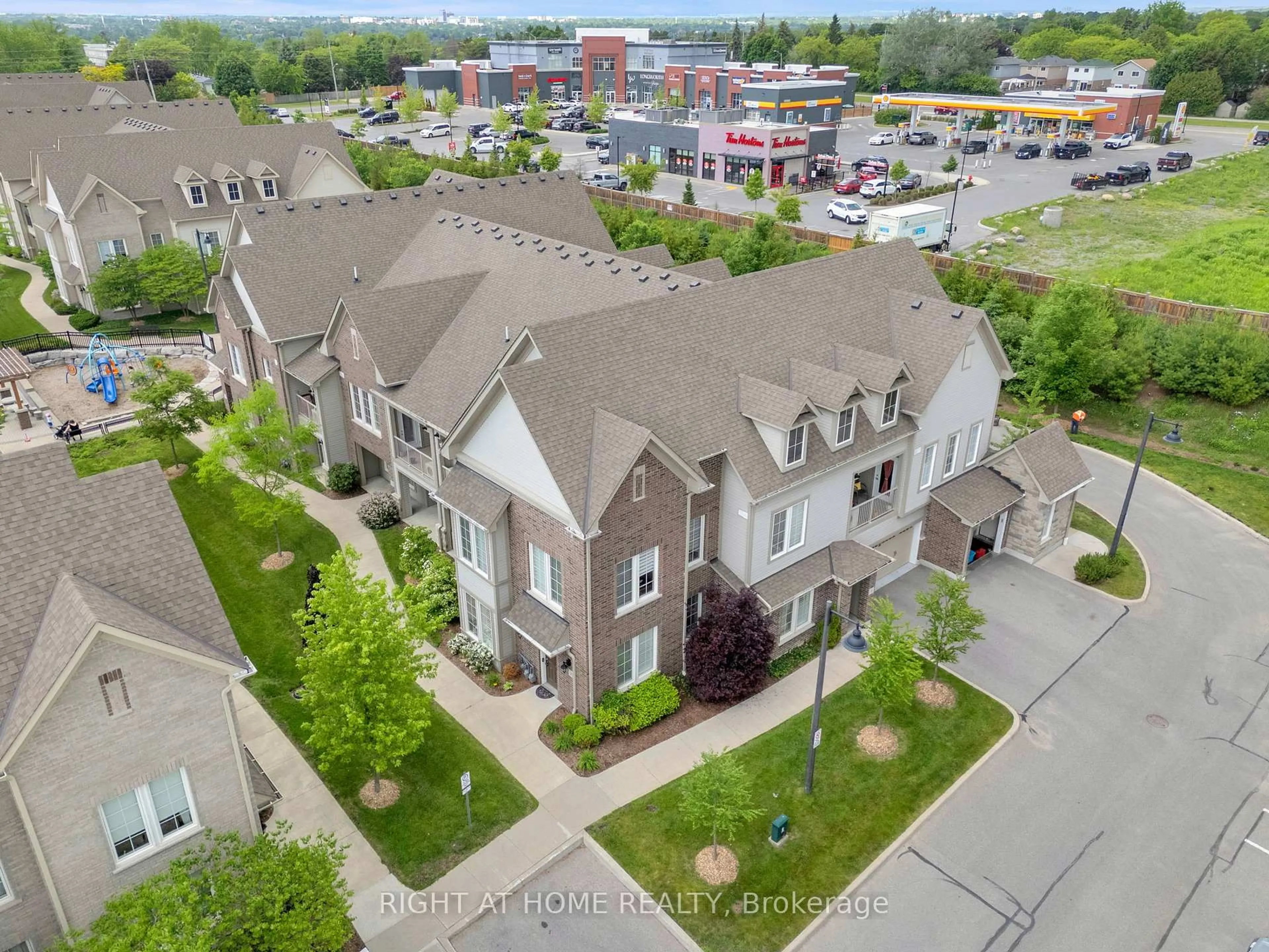 A pic from outside/outdoor area/front of a property/back of a property/a pic from drone, city buildings view from balcony for 1430 Gord Vinson Ave #20, Clarington Ontario L1E 0J6