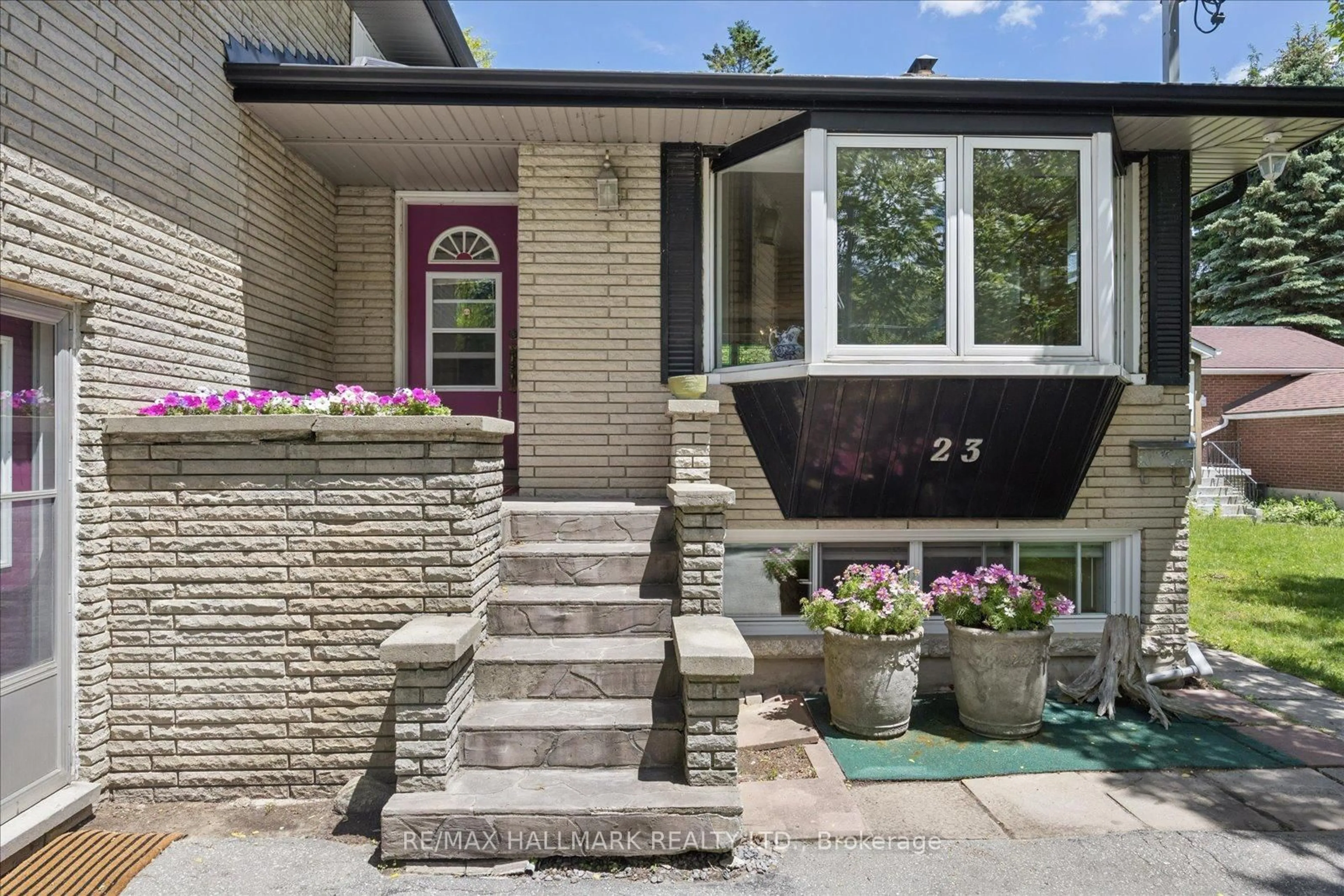 Home with brick exterior material, street for 23 Larwood Blvd, Toronto Ontario M1M 2M6