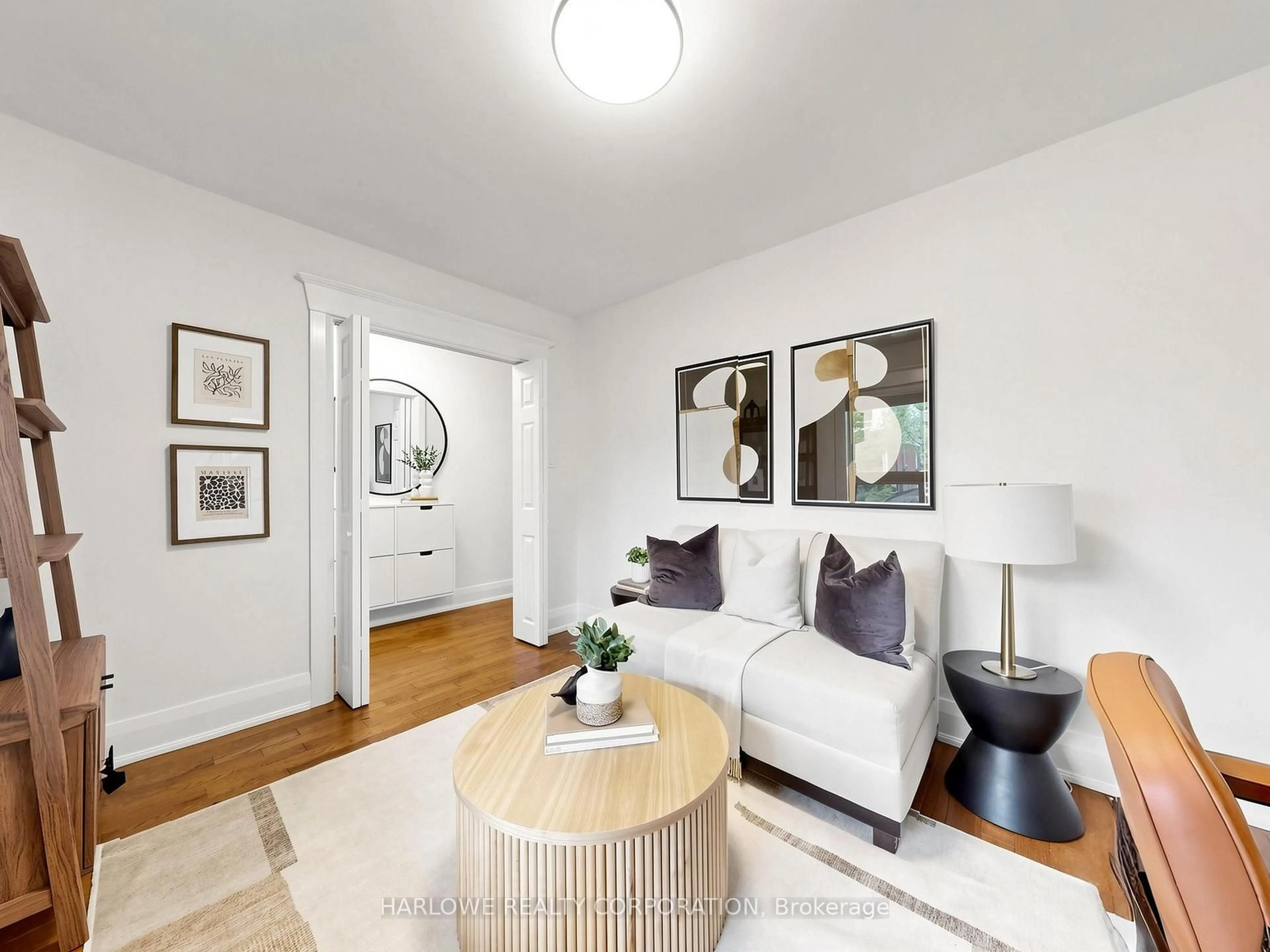 Living room with furniture, unknown for 118 Woodmount Ave, Toronto Ontario M4C 3Y6