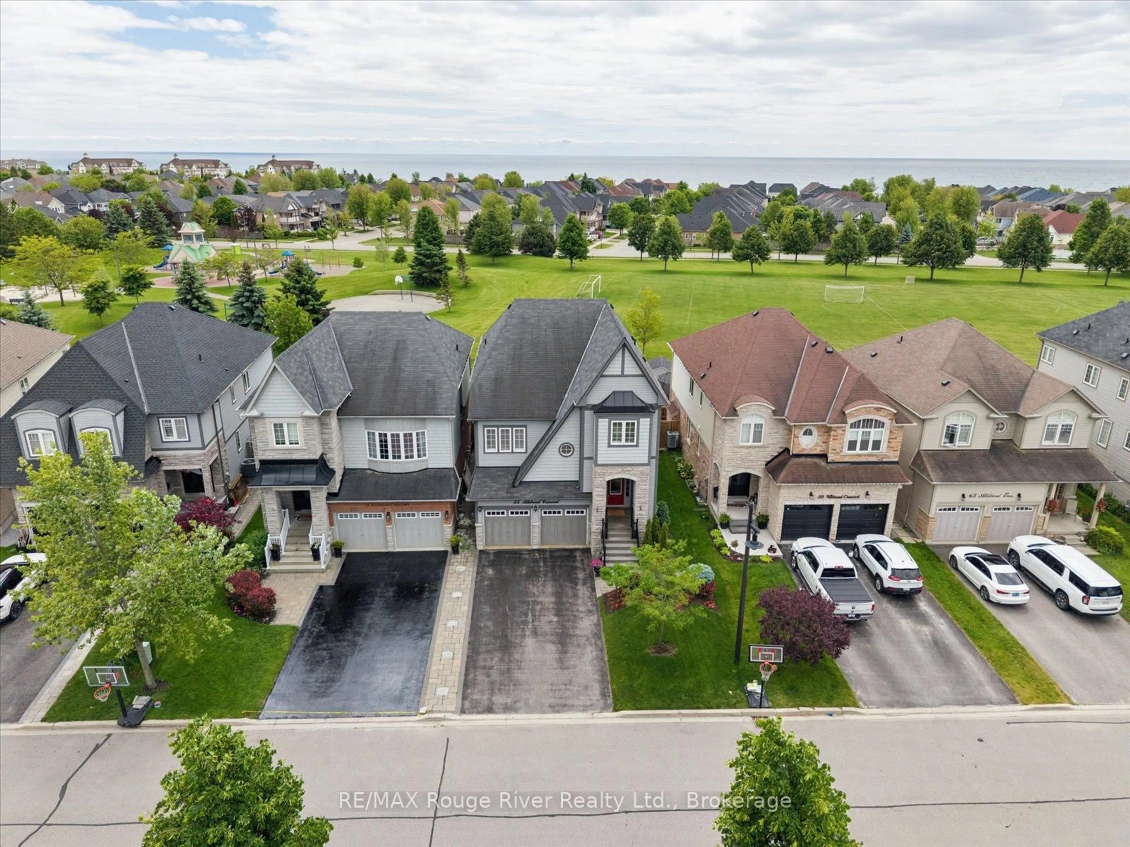 A pic from outside/outdoor area/front of a property/back of a property/a pic from drone, water/lake/river/ocean view for 55 Alldread Cres, Clarington Ontario L1B 0C2