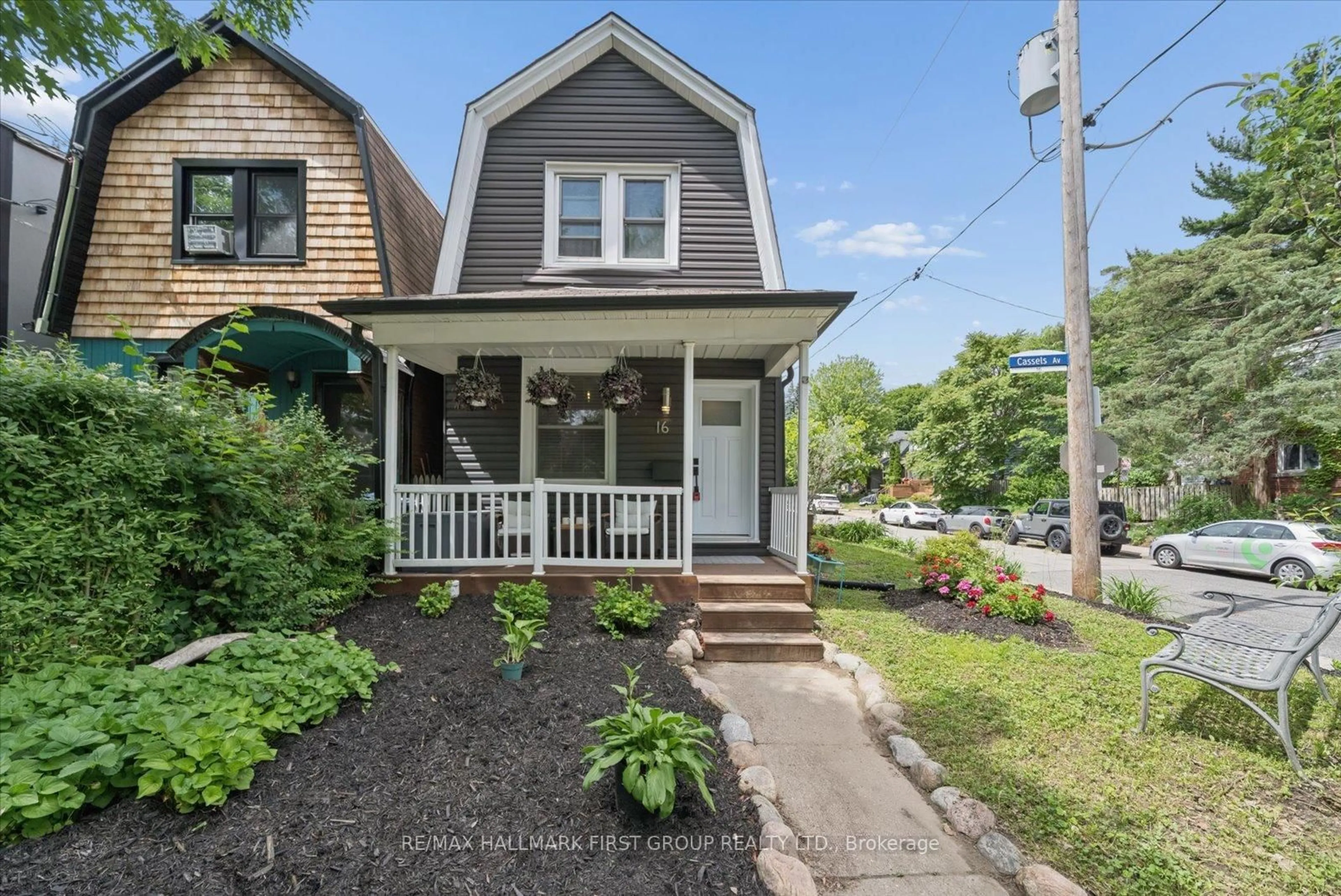 Home with vinyl exterior material, street for 16 Cassels Ave, Toronto Ontario M4E 1X8