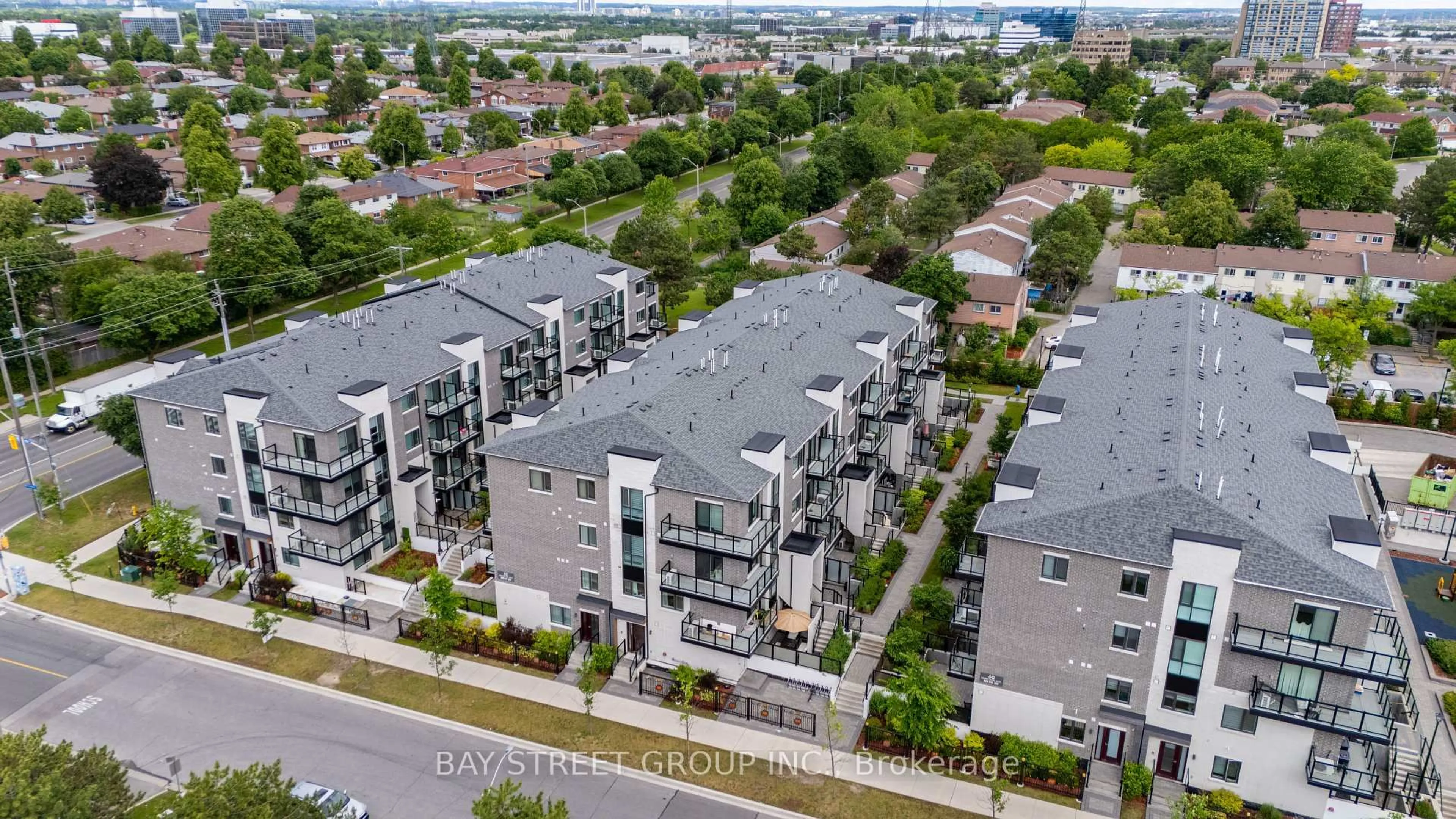 A pic from outside/outdoor area/front of a property/back of a property/a pic from drone, city buildings view from balcony for 50 Morecambe Gate #B207, Toronto Ontario M1W 0A9