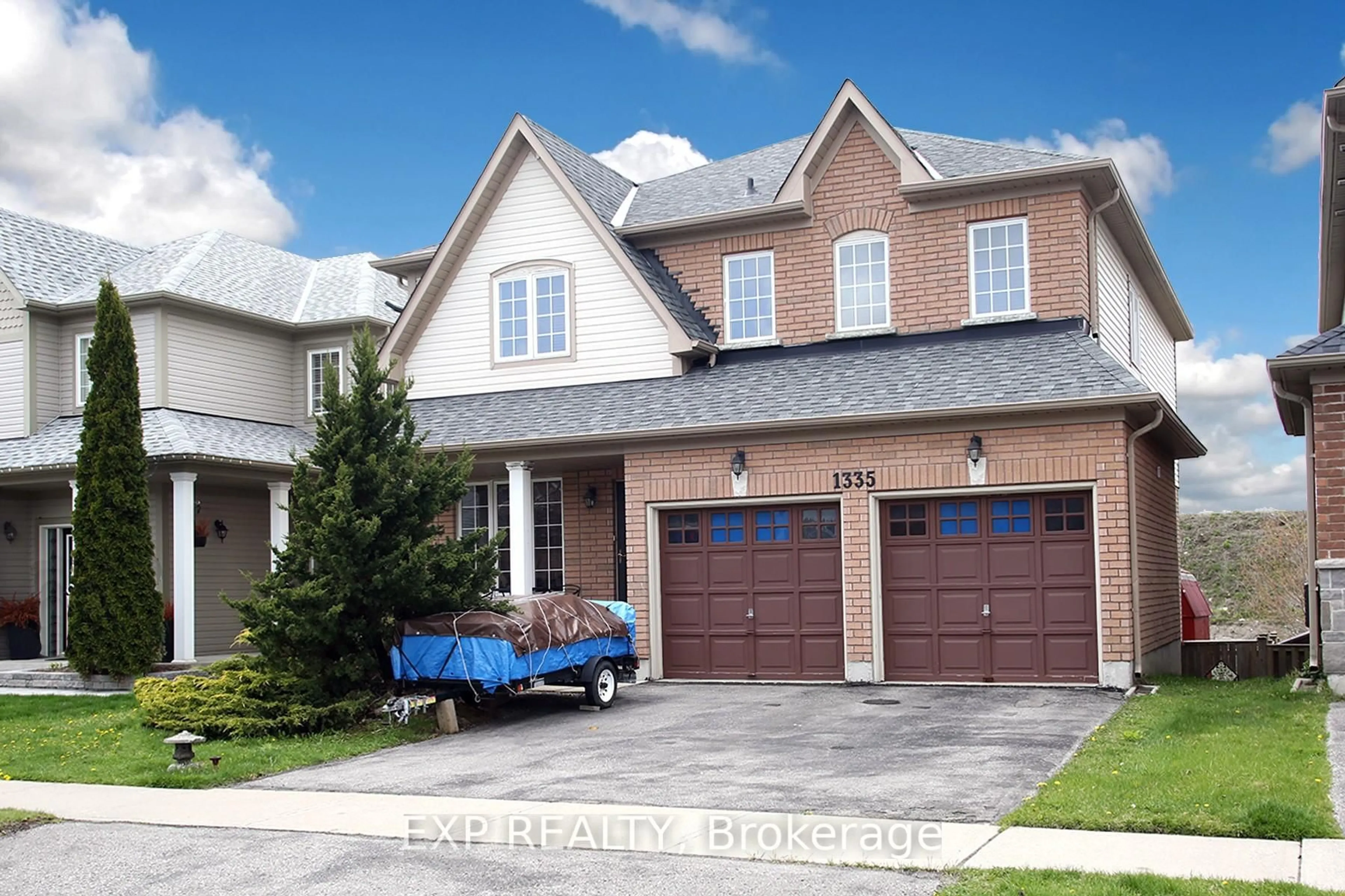 Home with brick exterior material, street for 1335 Langley Circ, Oshawa Ontario L1K 0E2