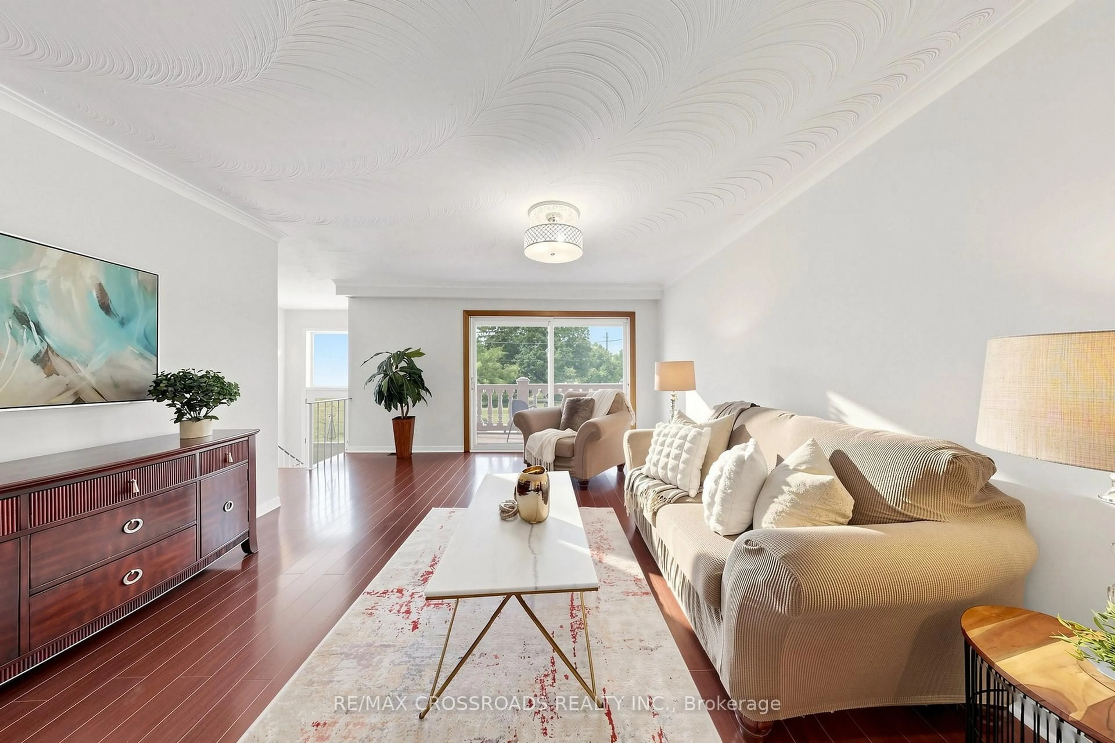 Living room with furniture, wood/laminate floor for 55 Bakerton Dr, Toronto Ontario M1J 2T3