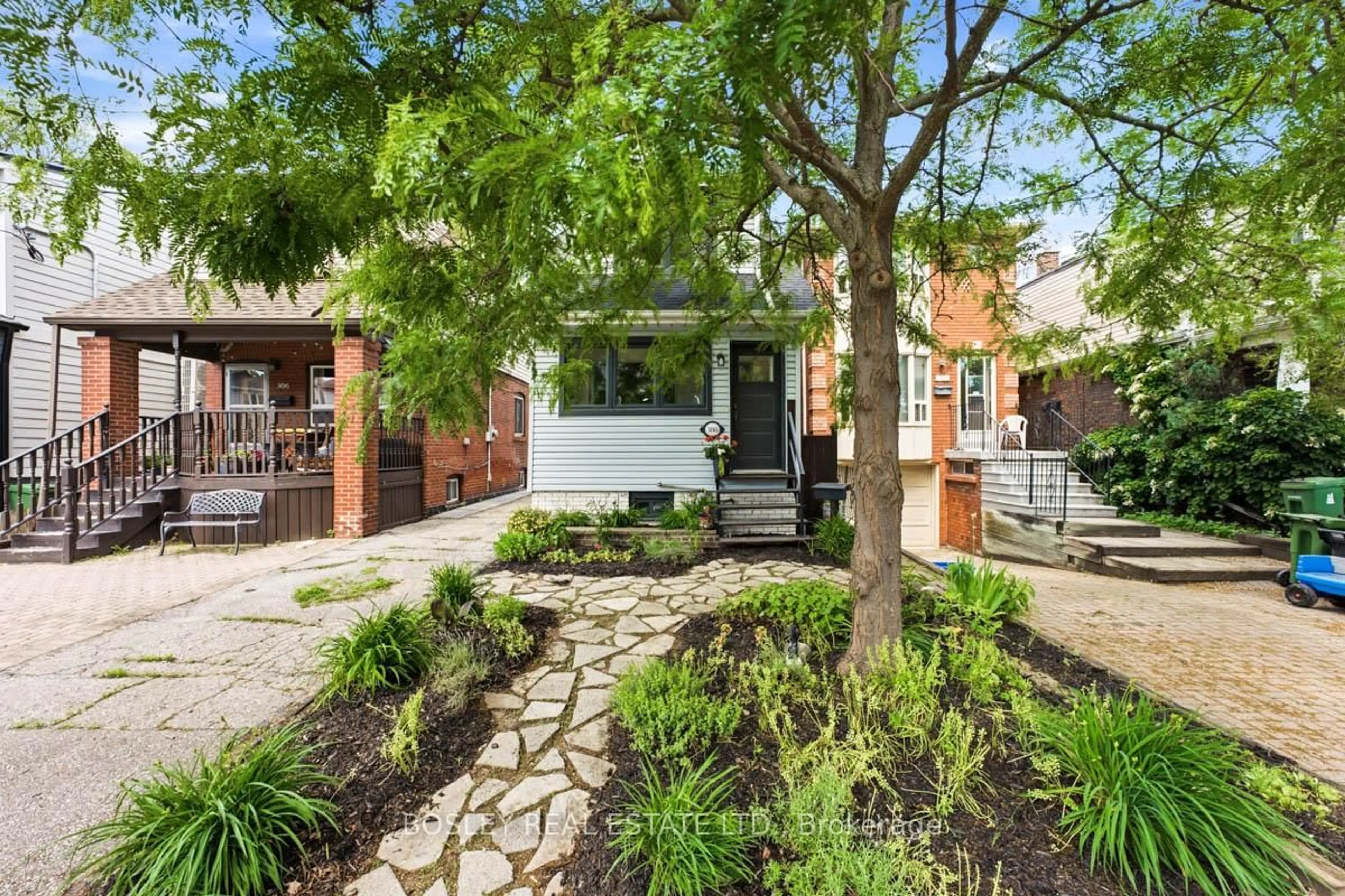 Home with brick exterior material, street for 308 Springdale Blvd, Toronto Ontario M4C 2A2