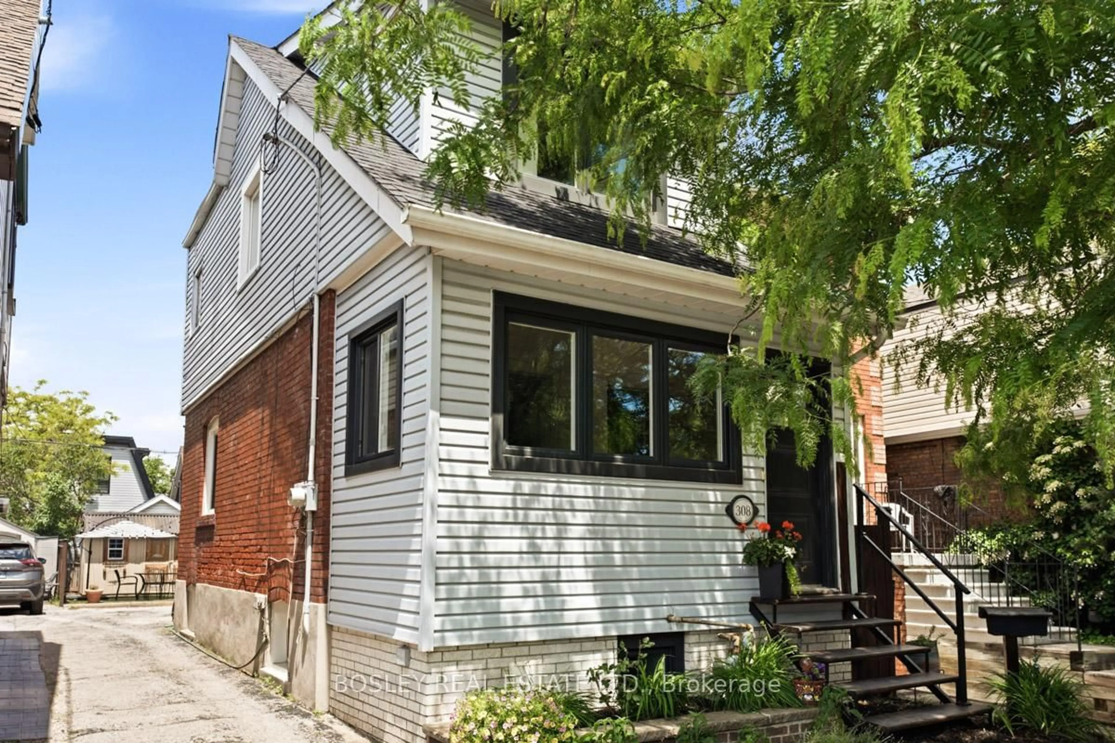 Home with brick exterior material, street for 308 Springdale Blvd, Toronto Ontario M4C 2A2