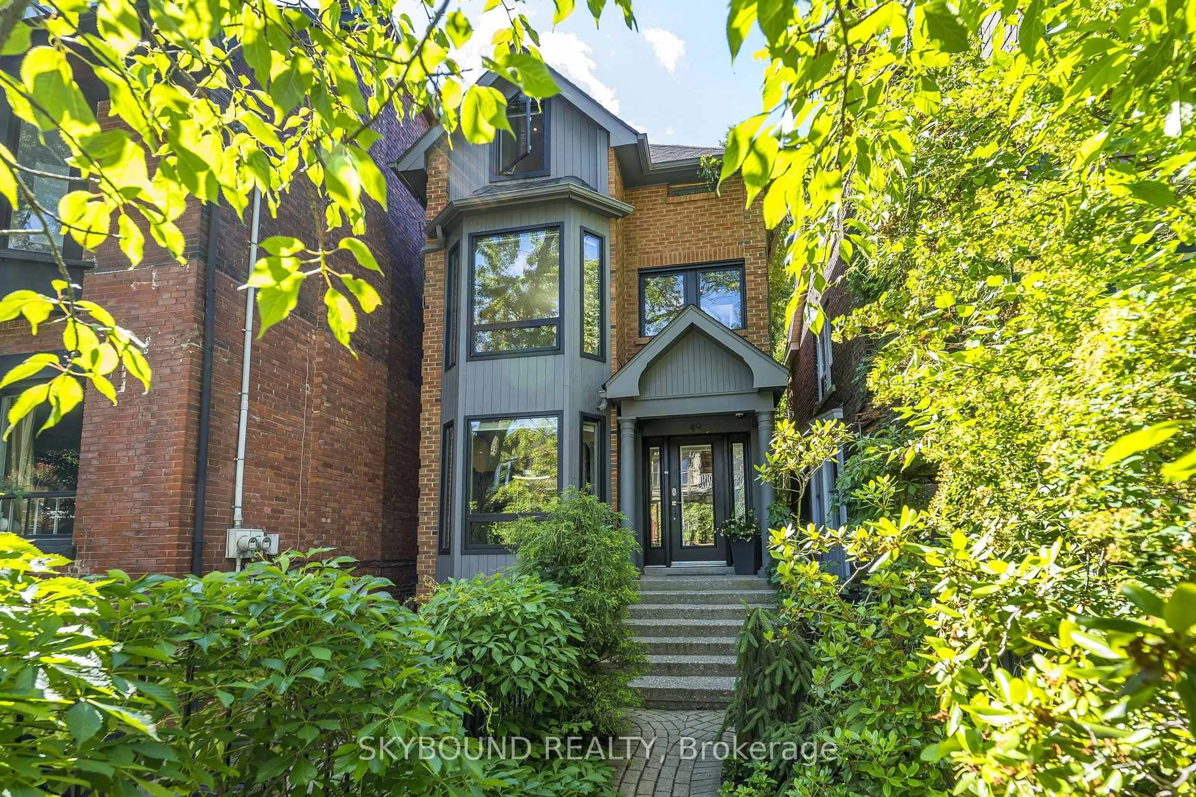 Home with brick exterior material, street for 49 Victor Ave, Toronto Ontario M4K 1A7