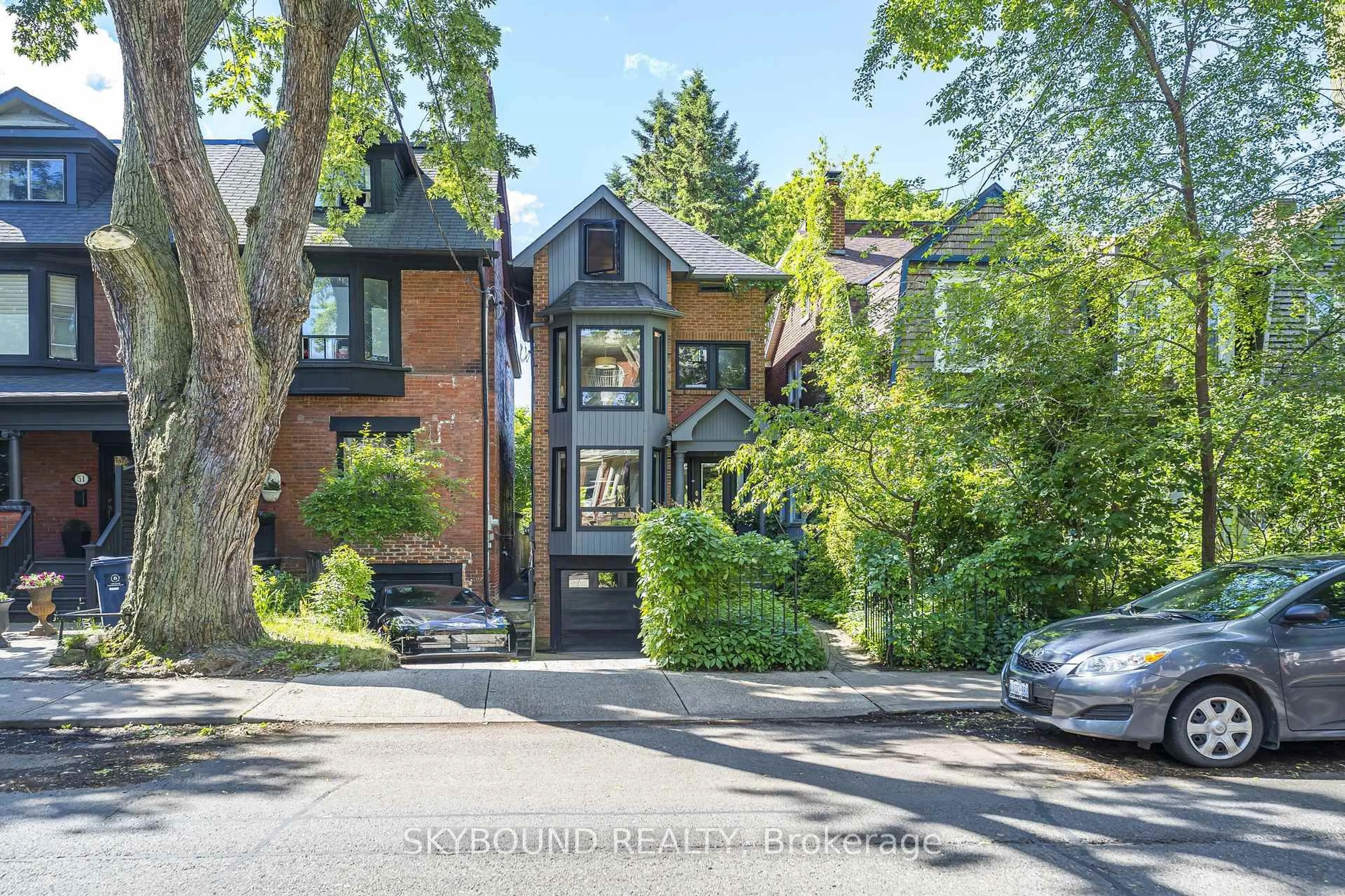 Home with brick exterior material, street for 49 Victor Ave, Toronto Ontario M4K 1A7