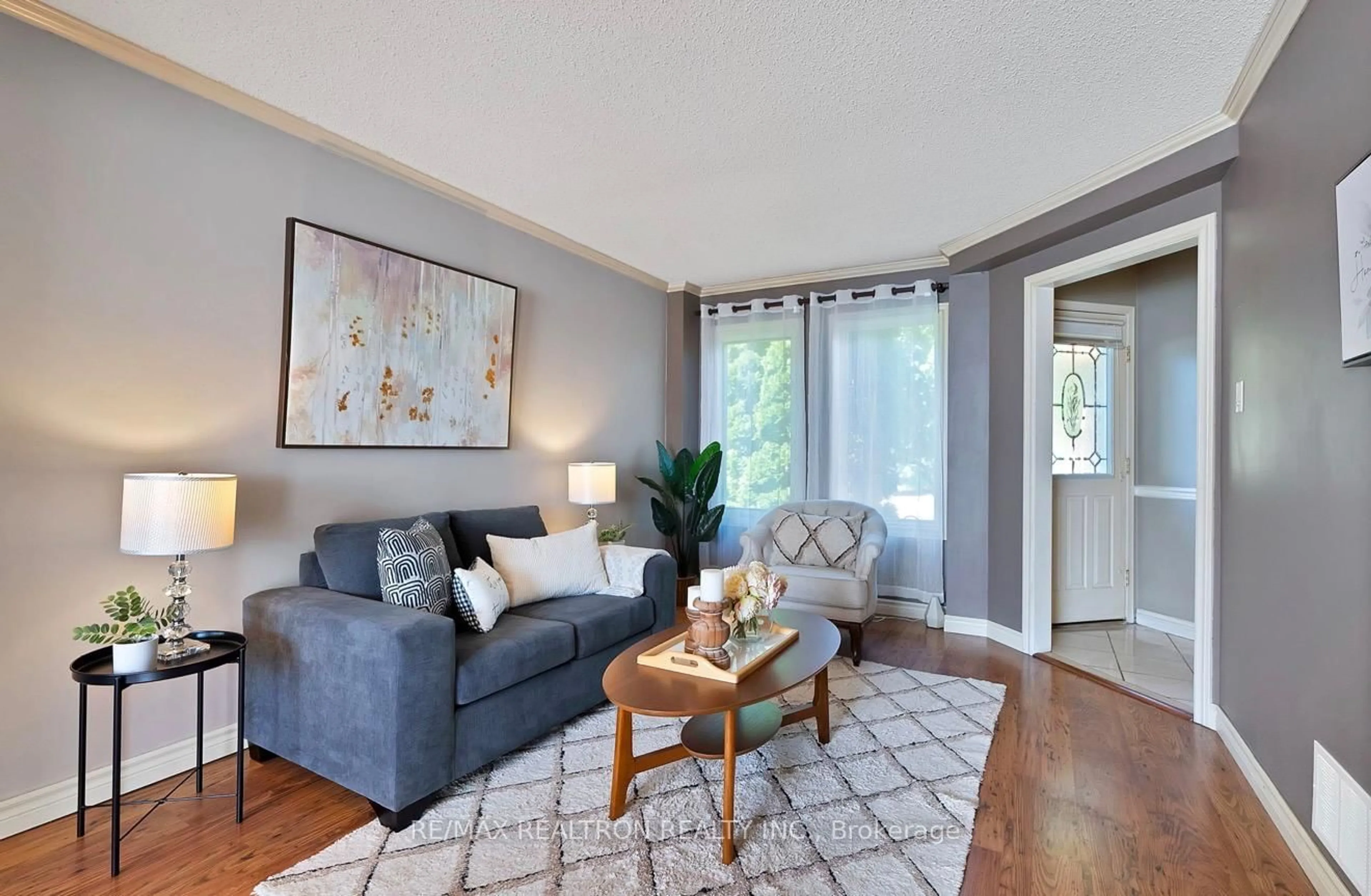 Living room with furniture, unknown for 67 Sable Cres, Whitby Ontario L1R 1Y6