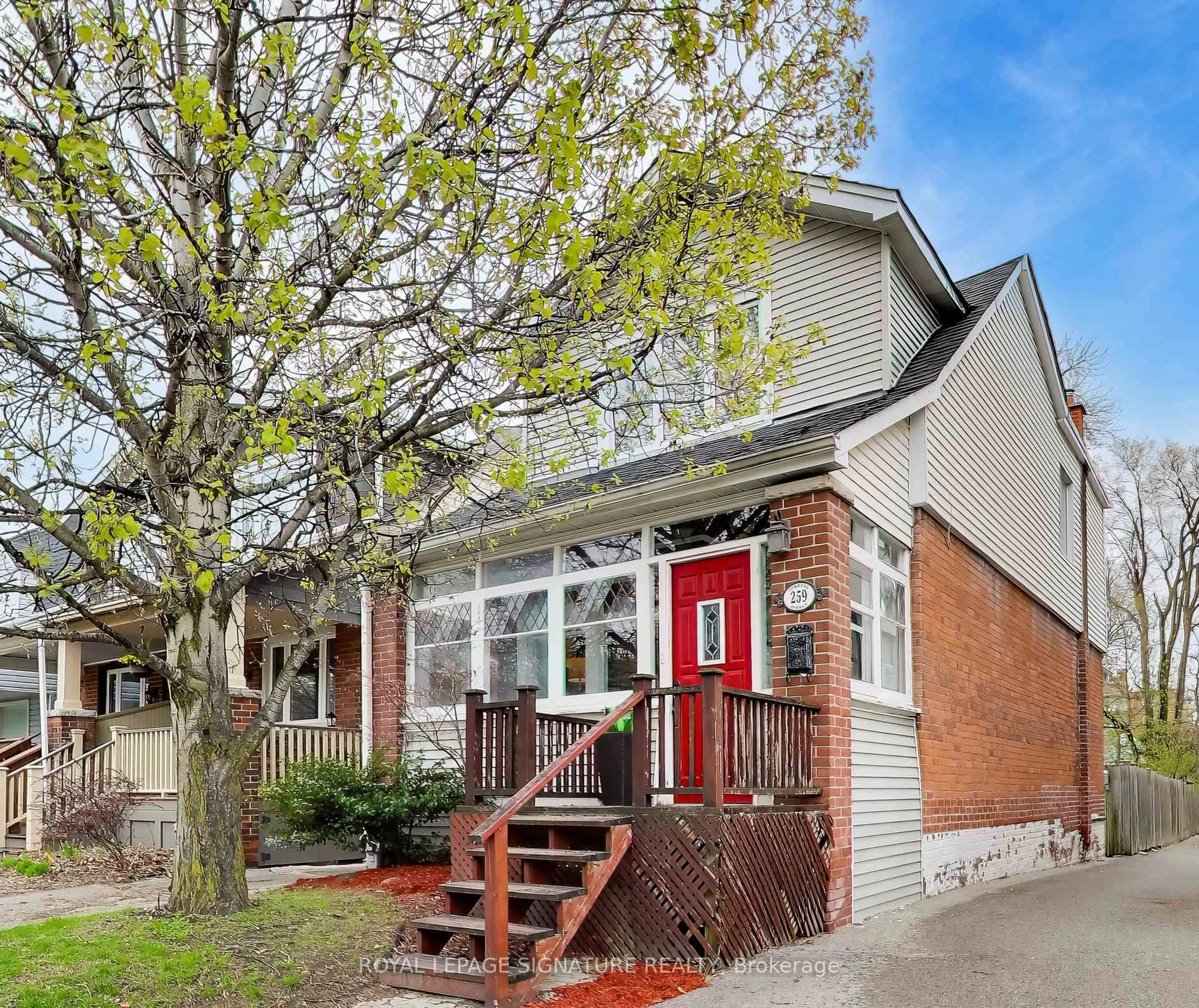 Home with brick exterior material, street for 259 Torrens Ave, Toronto Ontario M4J 2P6