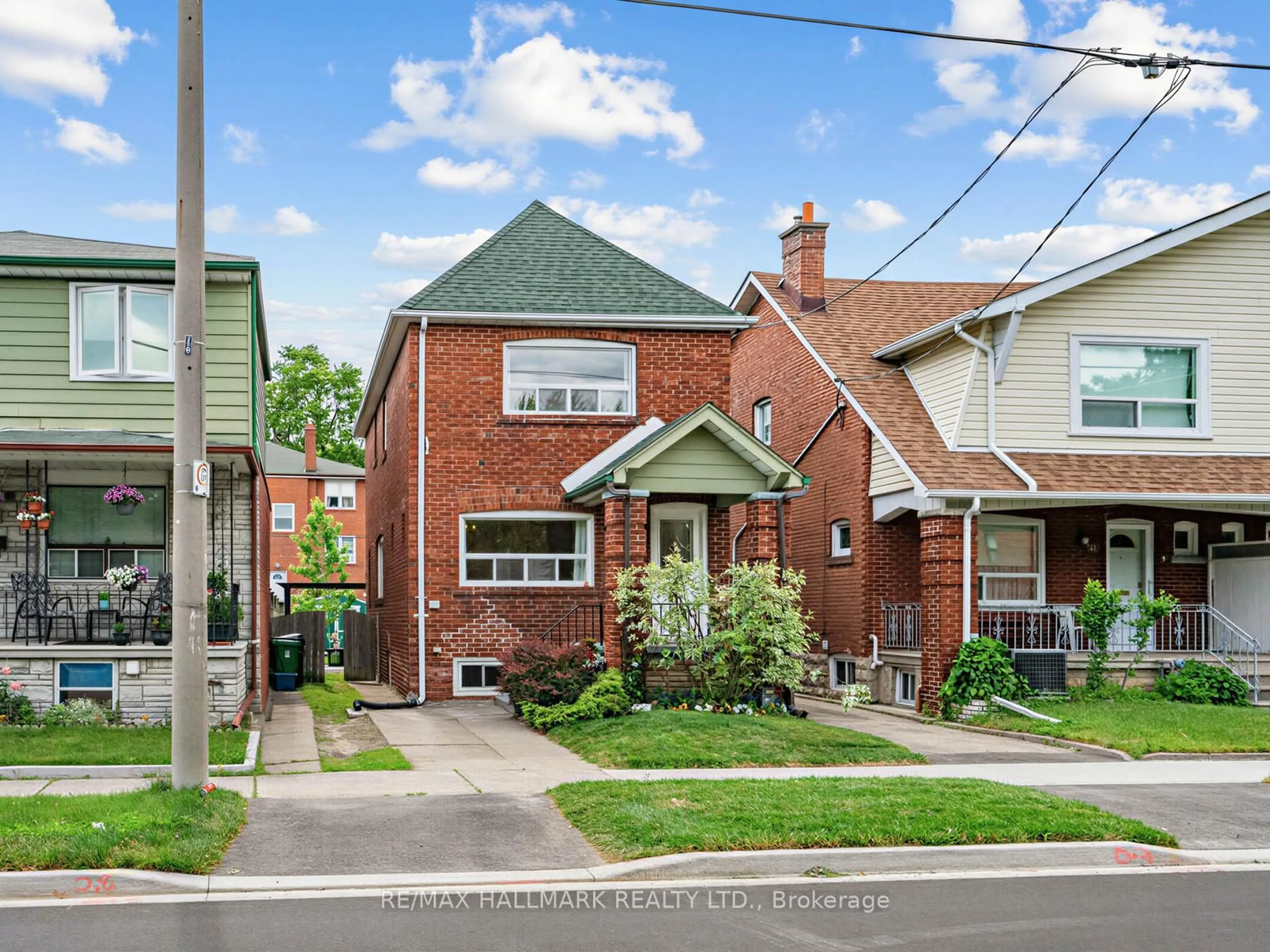 Home with brick exterior material, street for 958 Greenwood Ave, Toronto Ontario M4J 4C3