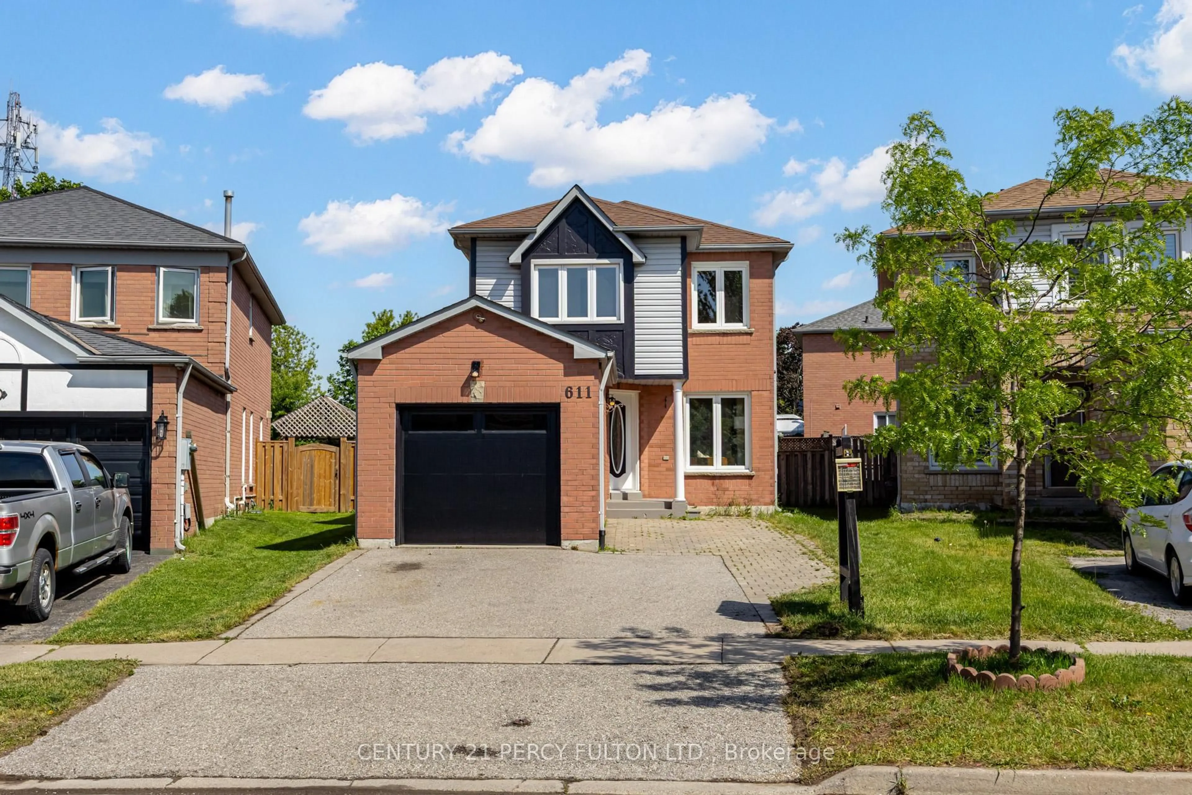 Home with brick exterior material, street for 611 Atwood Cres, Pickering Ontario L1W 3W7