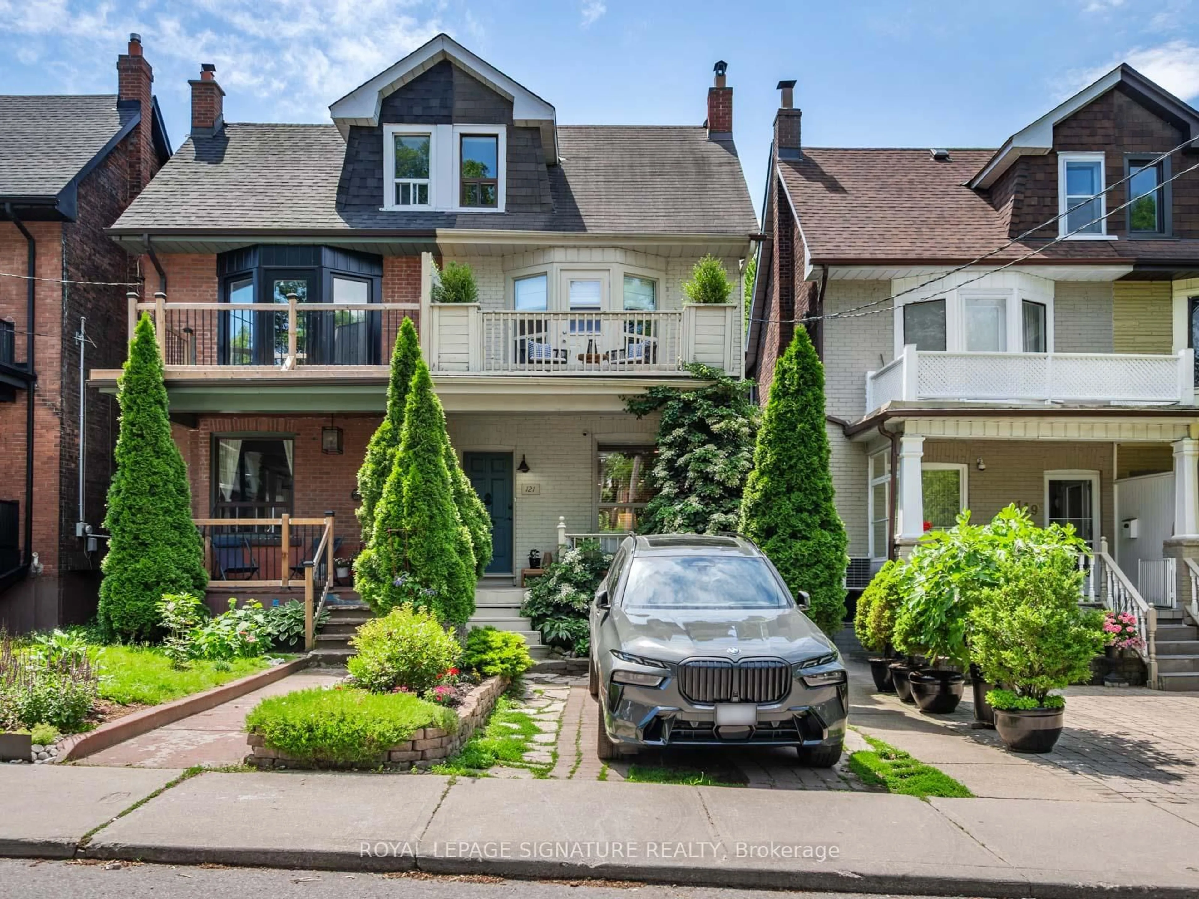 Home with brick exterior material, street for 121 Ivy Ave, Toronto Ontario M4L 2H8