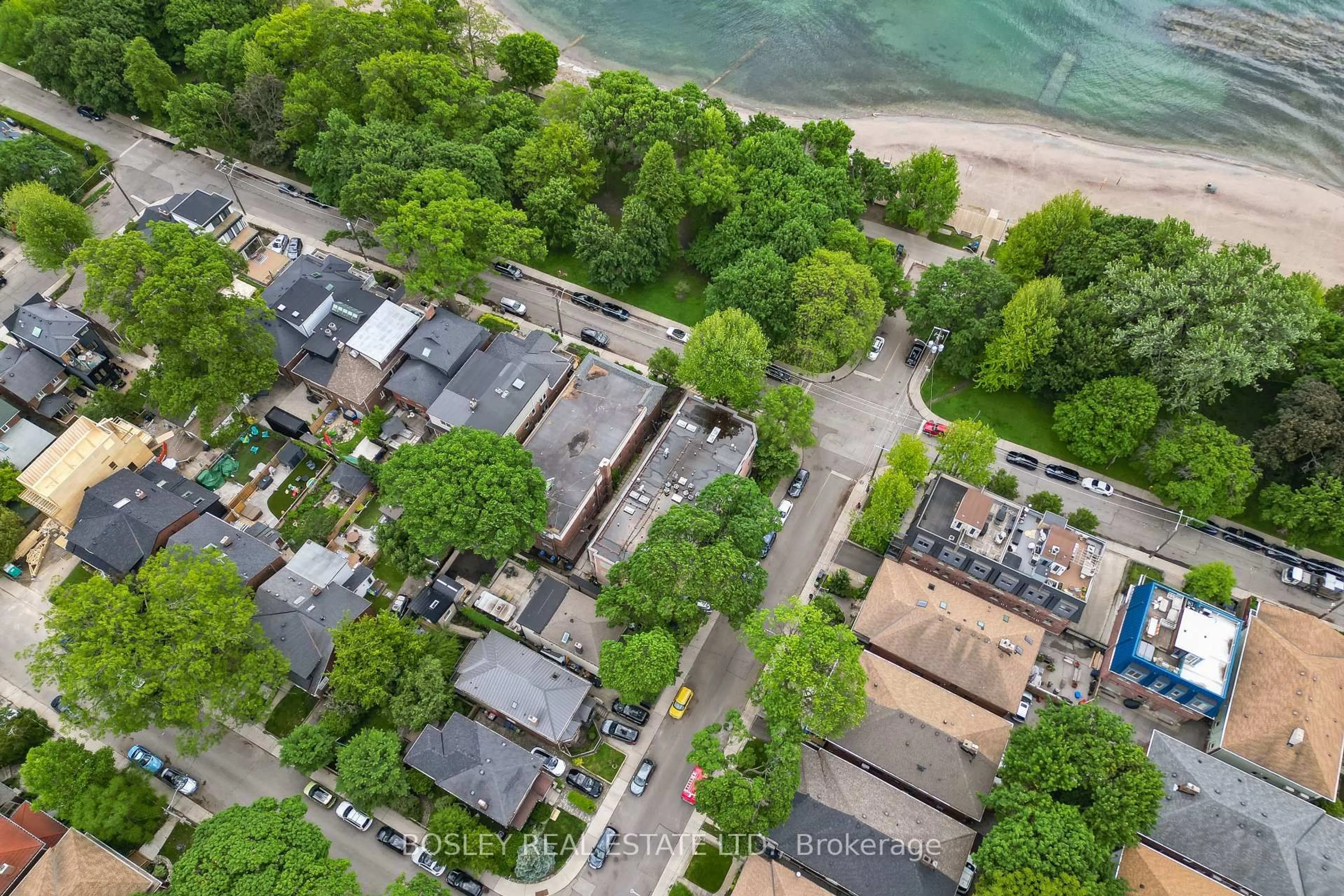 A pic from outside/outdoor area/front of a property/back of a property/a pic from drone, street for 15 Glen Manor Dr #204, Toronto Ontario M4E 2X3