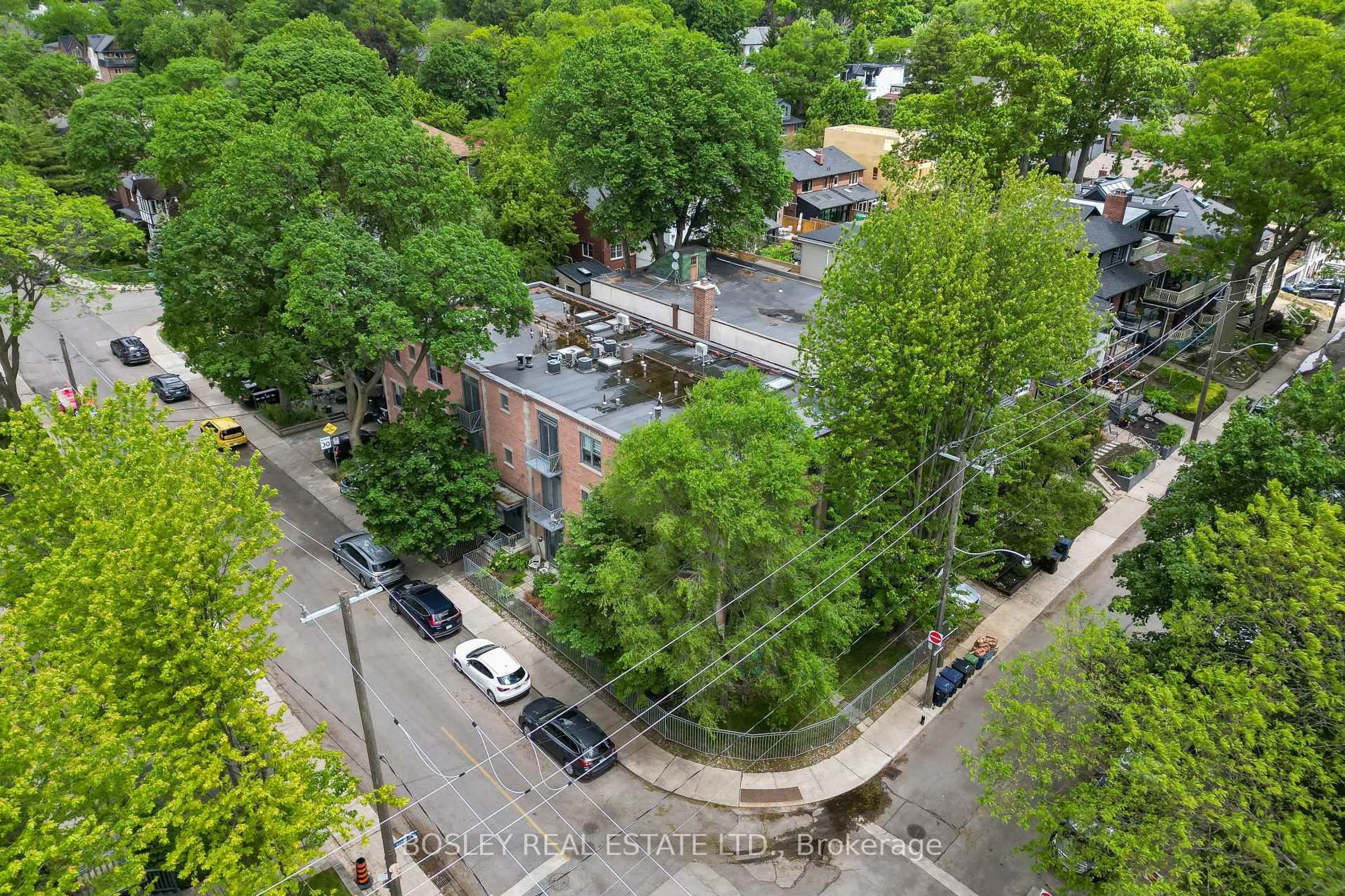 A pic from outside/outdoor area/front of a property/back of a property/a pic from drone, city buildings view from balcony for 15 Glen Manor Dr #204, Toronto Ontario M4E 2X3