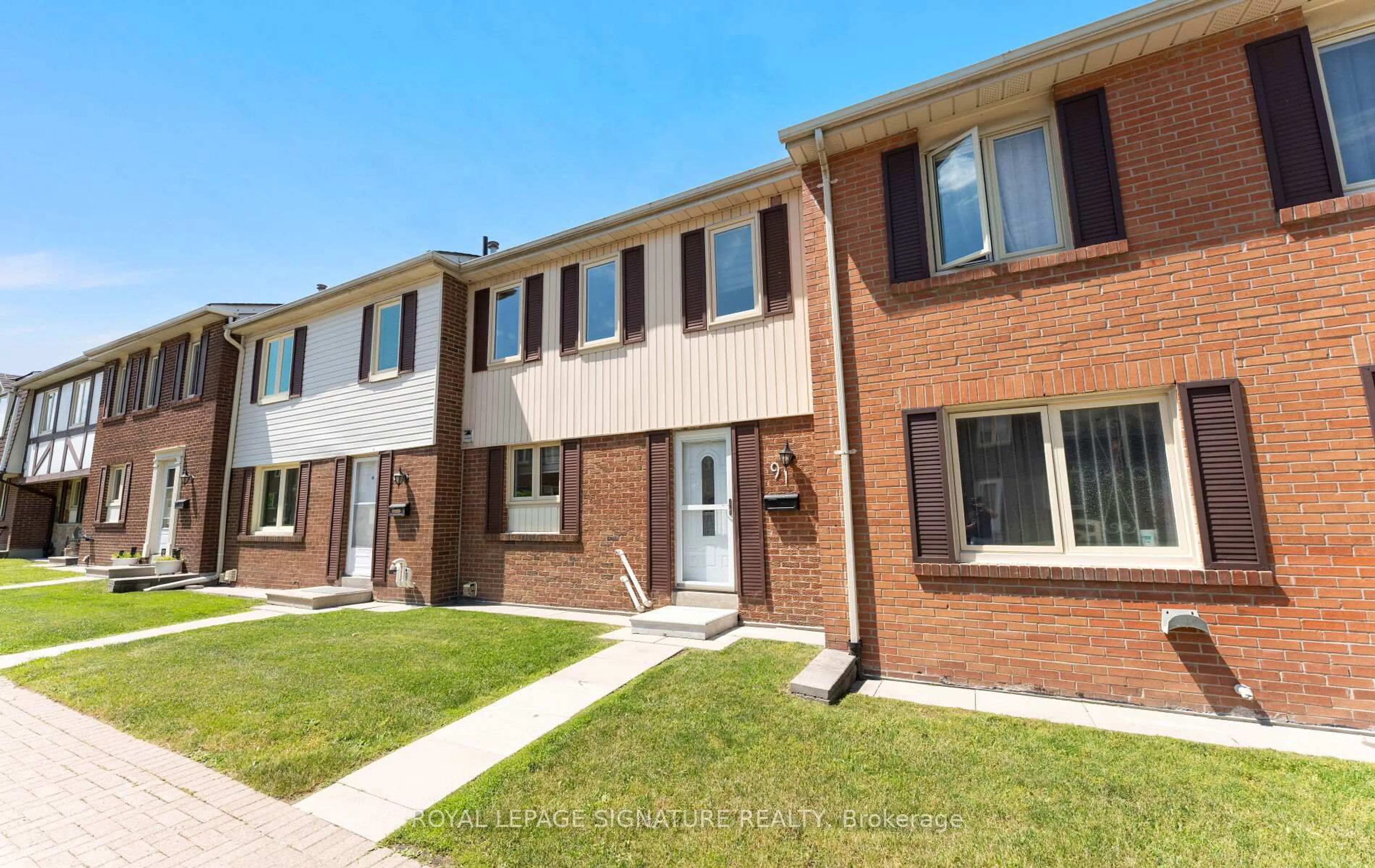 Home with brick exterior material, street for 270 Timberbank Blvd #91, Toronto Ontario M1W 2M1