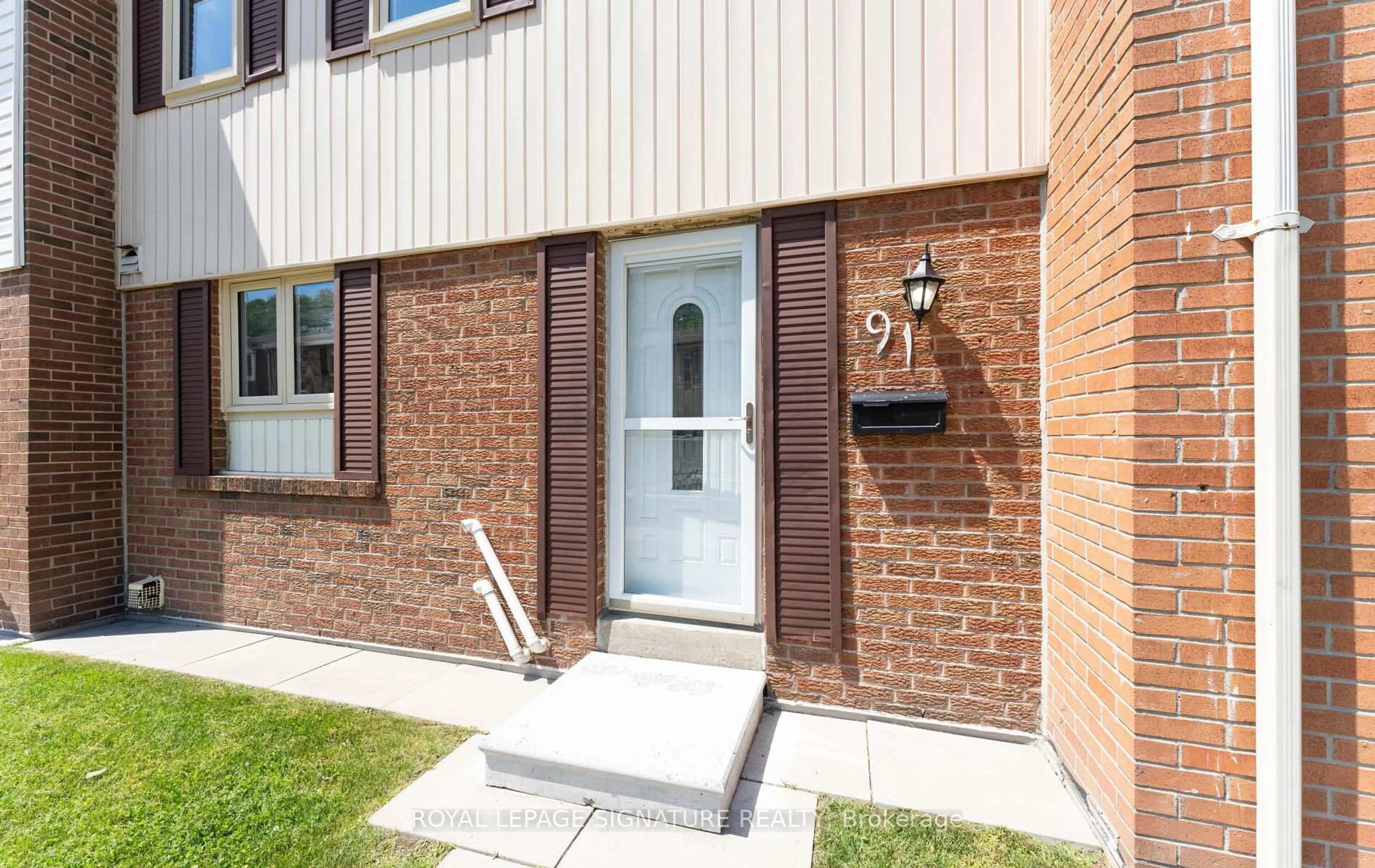 Home with brick exterior material, street for 270 Timberbank Blvd #91, Toronto Ontario M1W 2M1