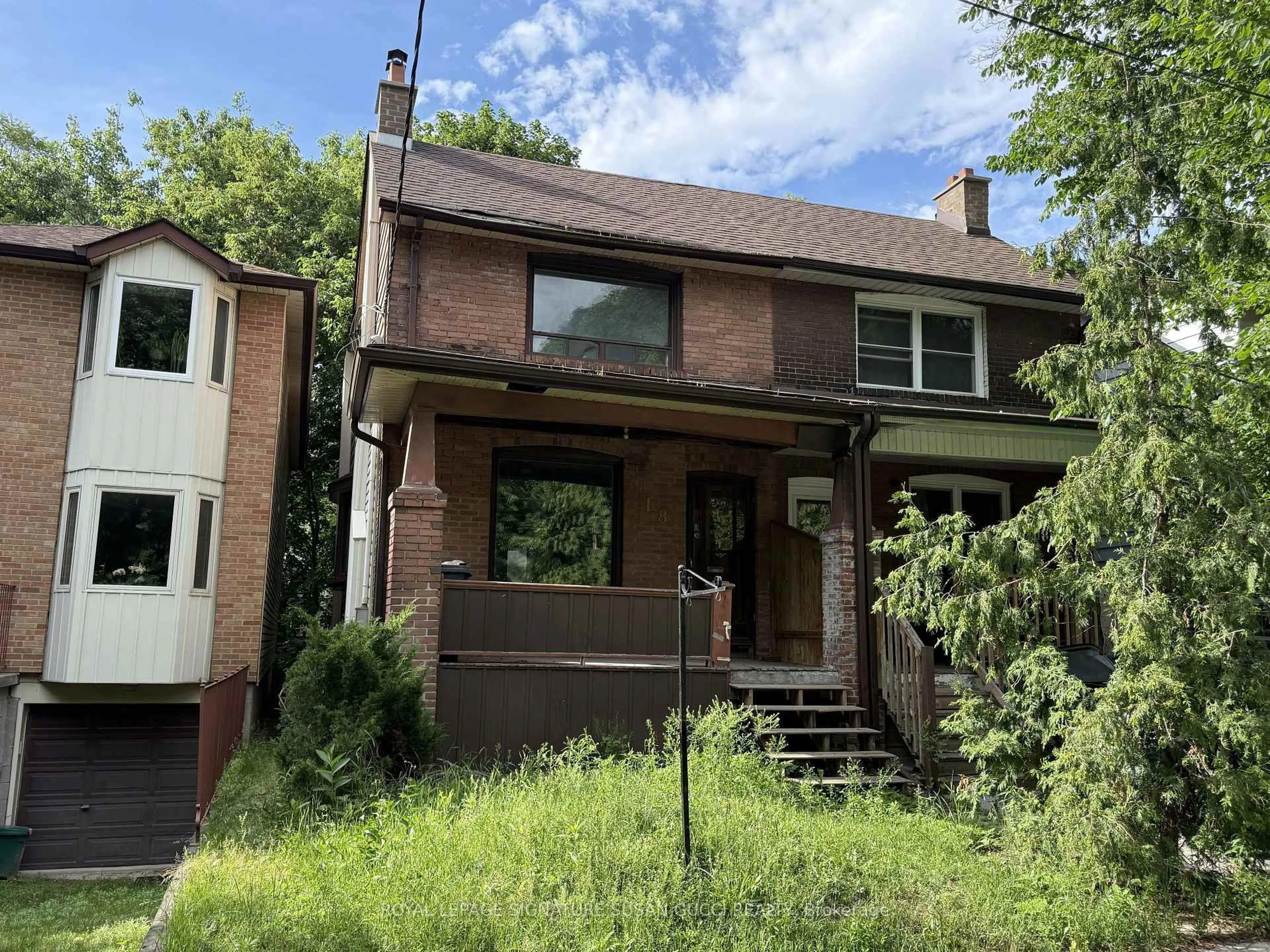 Home with brick exterior material, street for 18 Aldergrove Ave, Toronto Ontario M4C 1B2