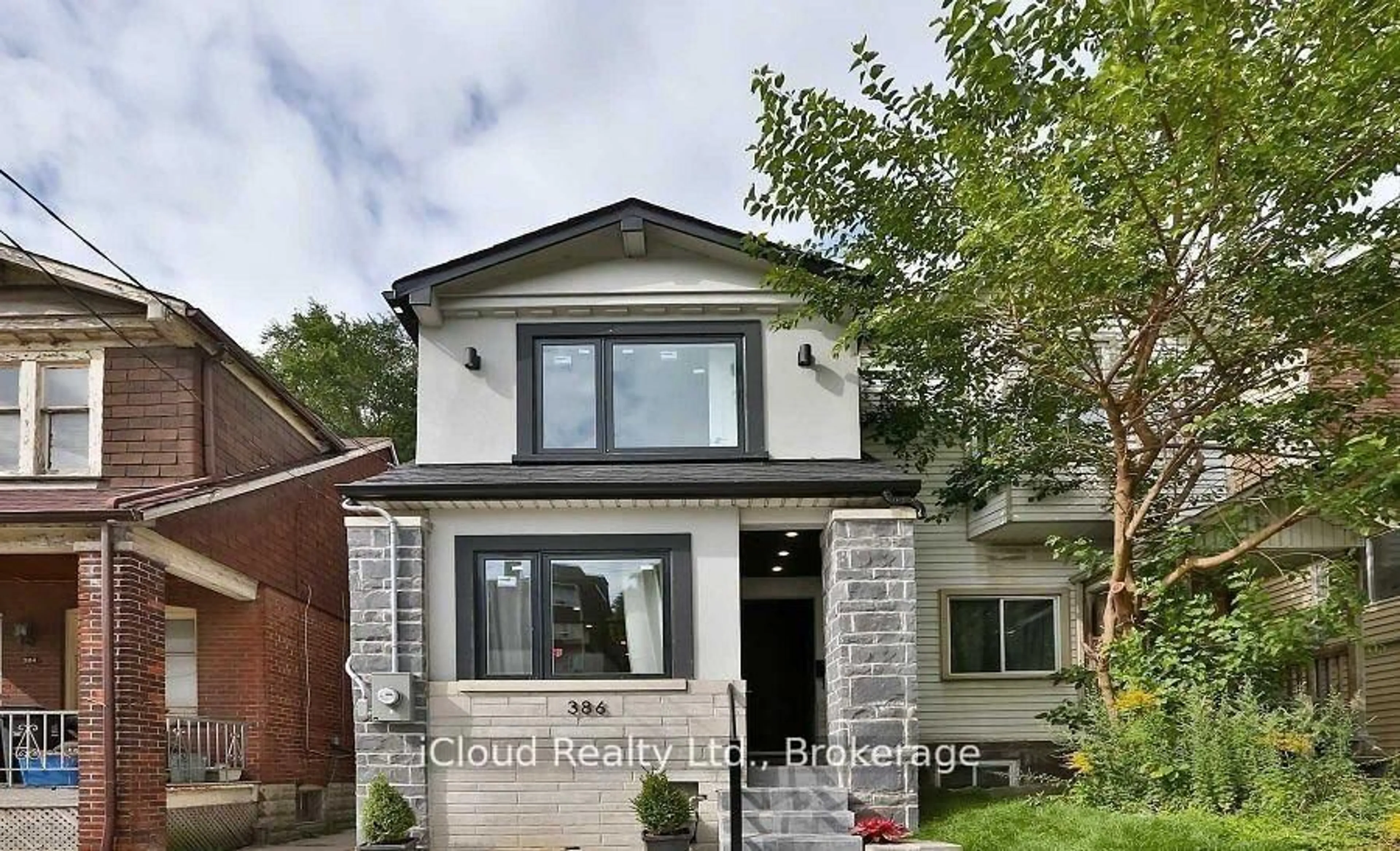 Home with brick exterior material, street for 386 Coxwell Ave, Toronto Ontario M4L 3B7