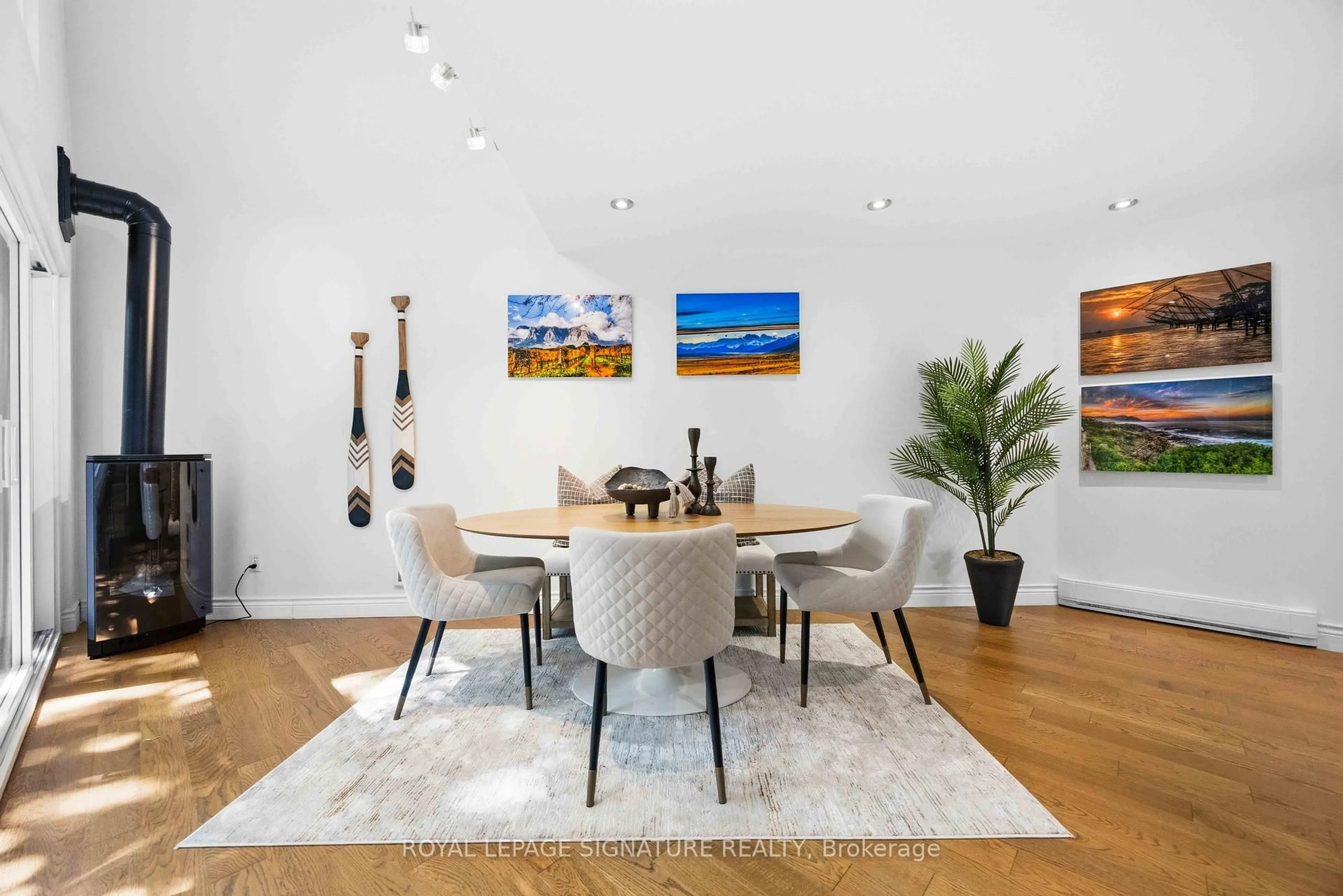 Dining room, wood/laminate floor for 2366 Queen St #7, Toronto Ontario M4E 1H4