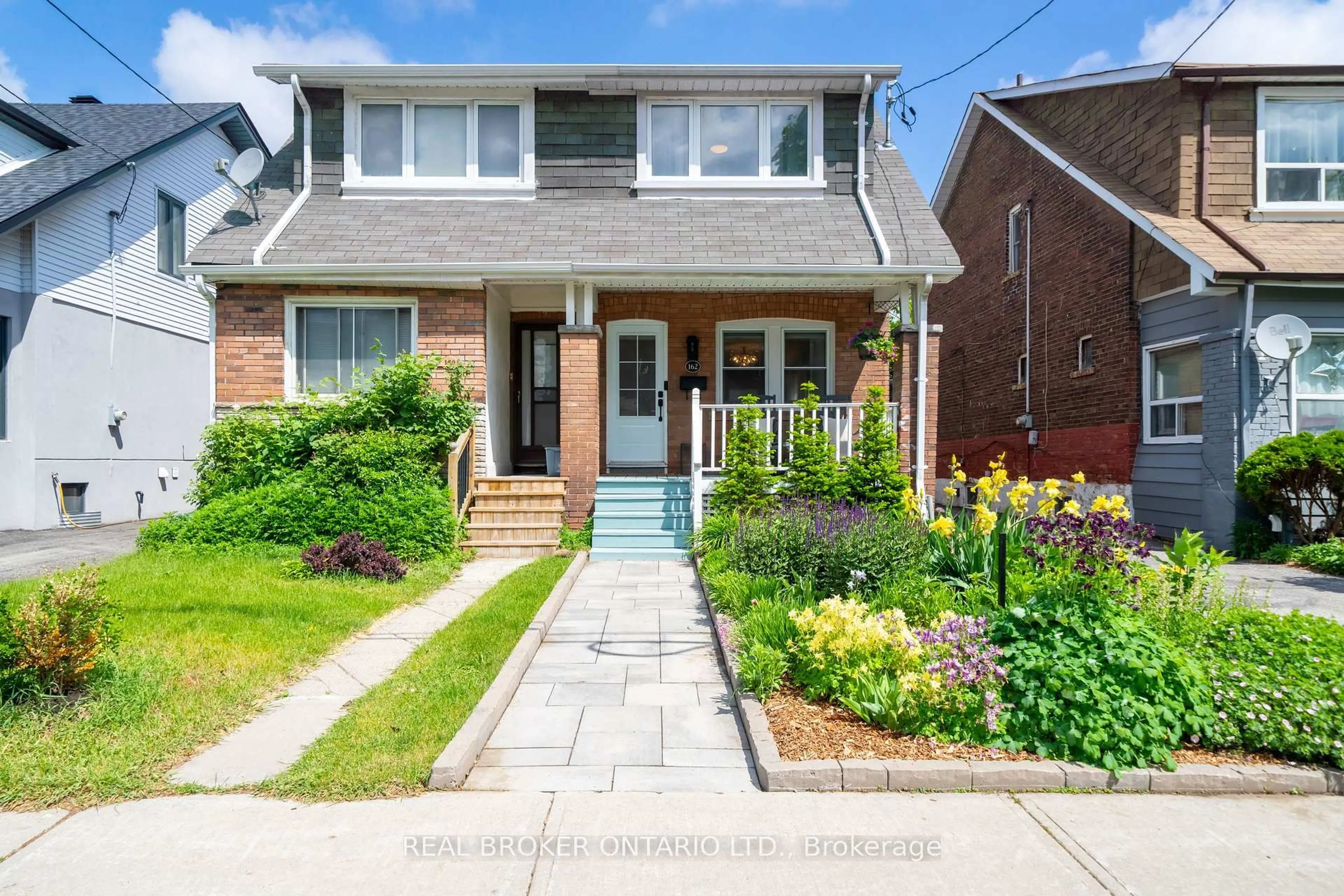 Home with brick exterior material, street for 162 Coleman Ave, Toronto Ontario M4C 1R2