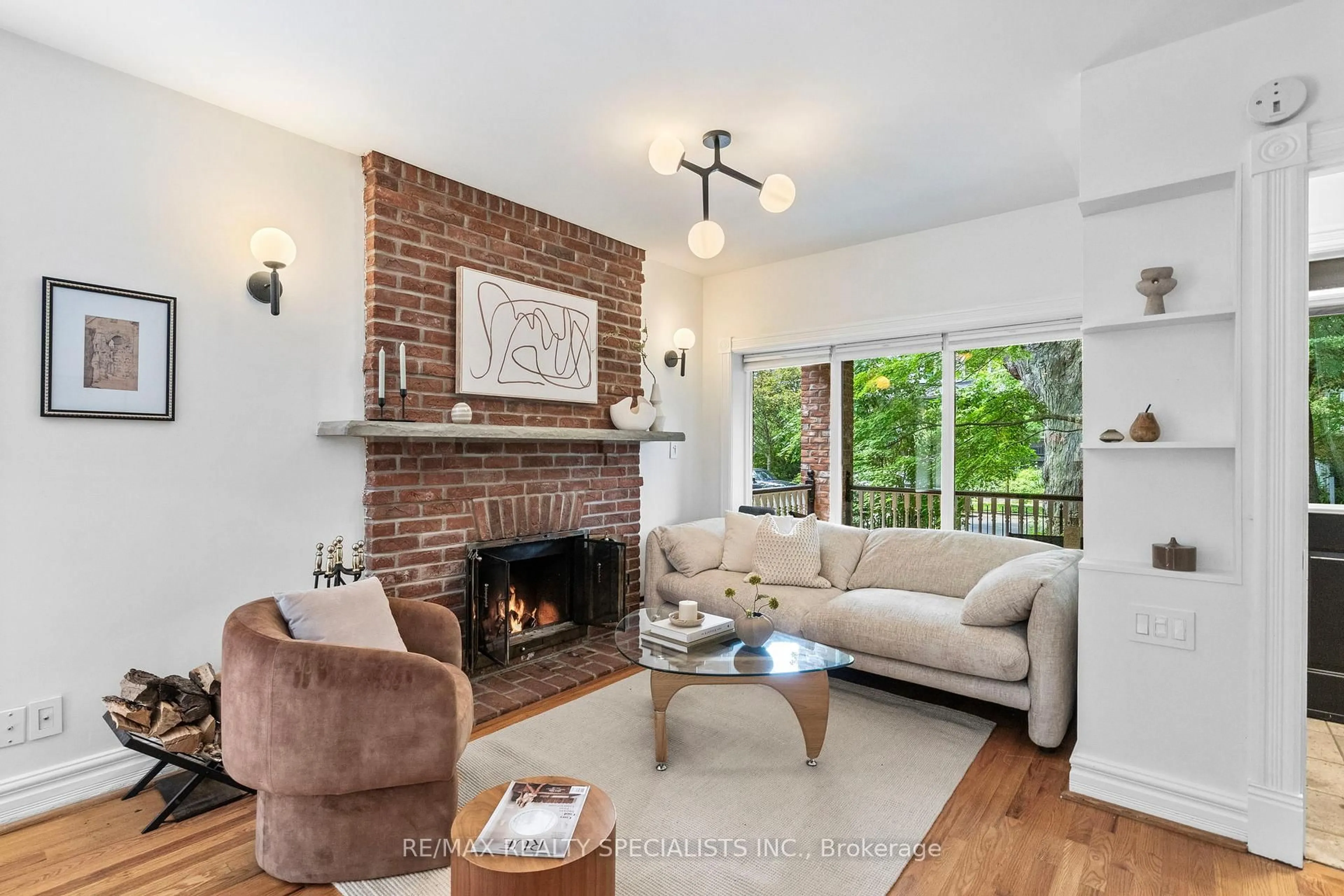 Living room with furniture, unknown for 117 Alton Ave, Toronto Ontario M4L 2M3