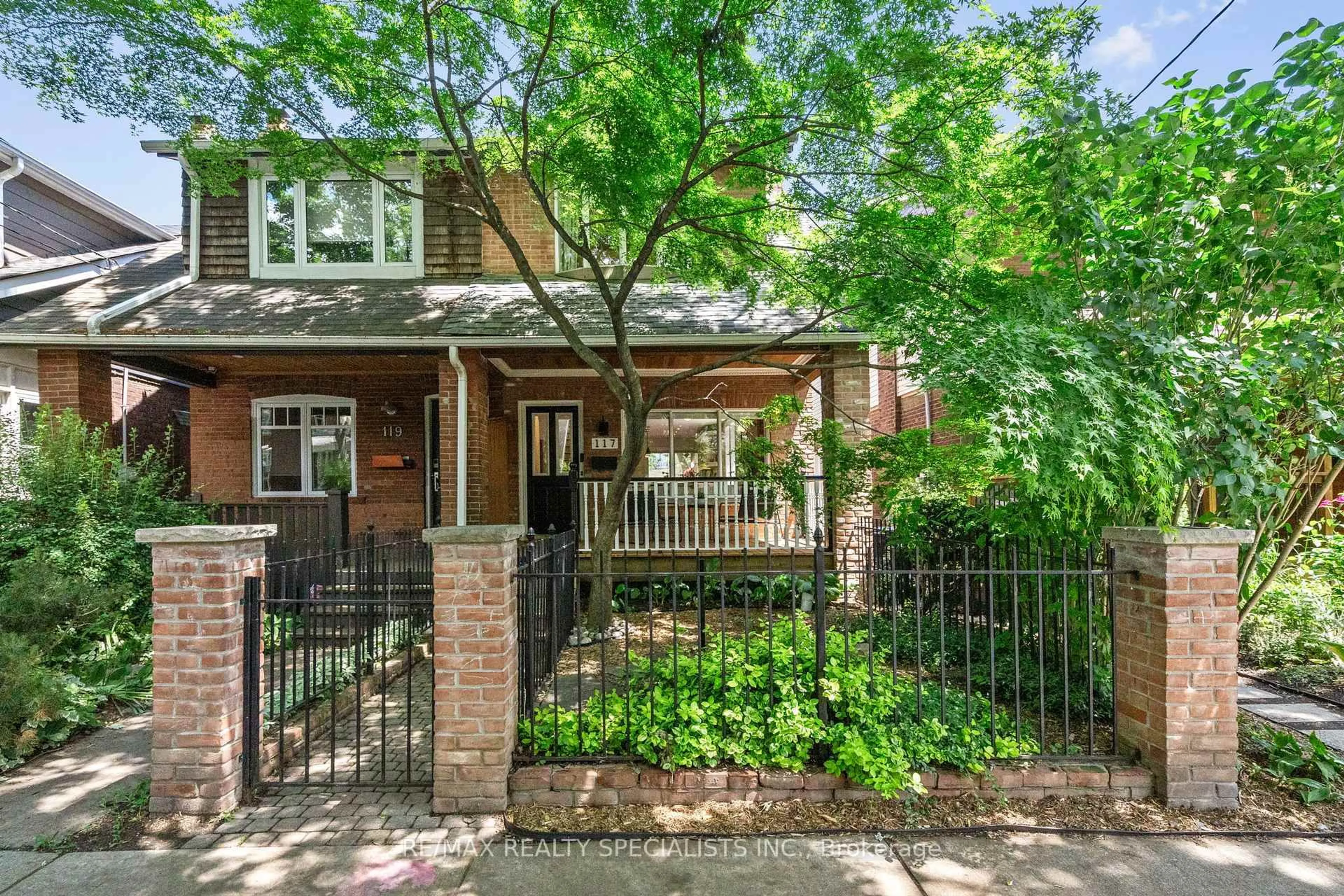 Home with brick exterior material, street for 117 Alton Ave, Toronto Ontario M4L 2M3