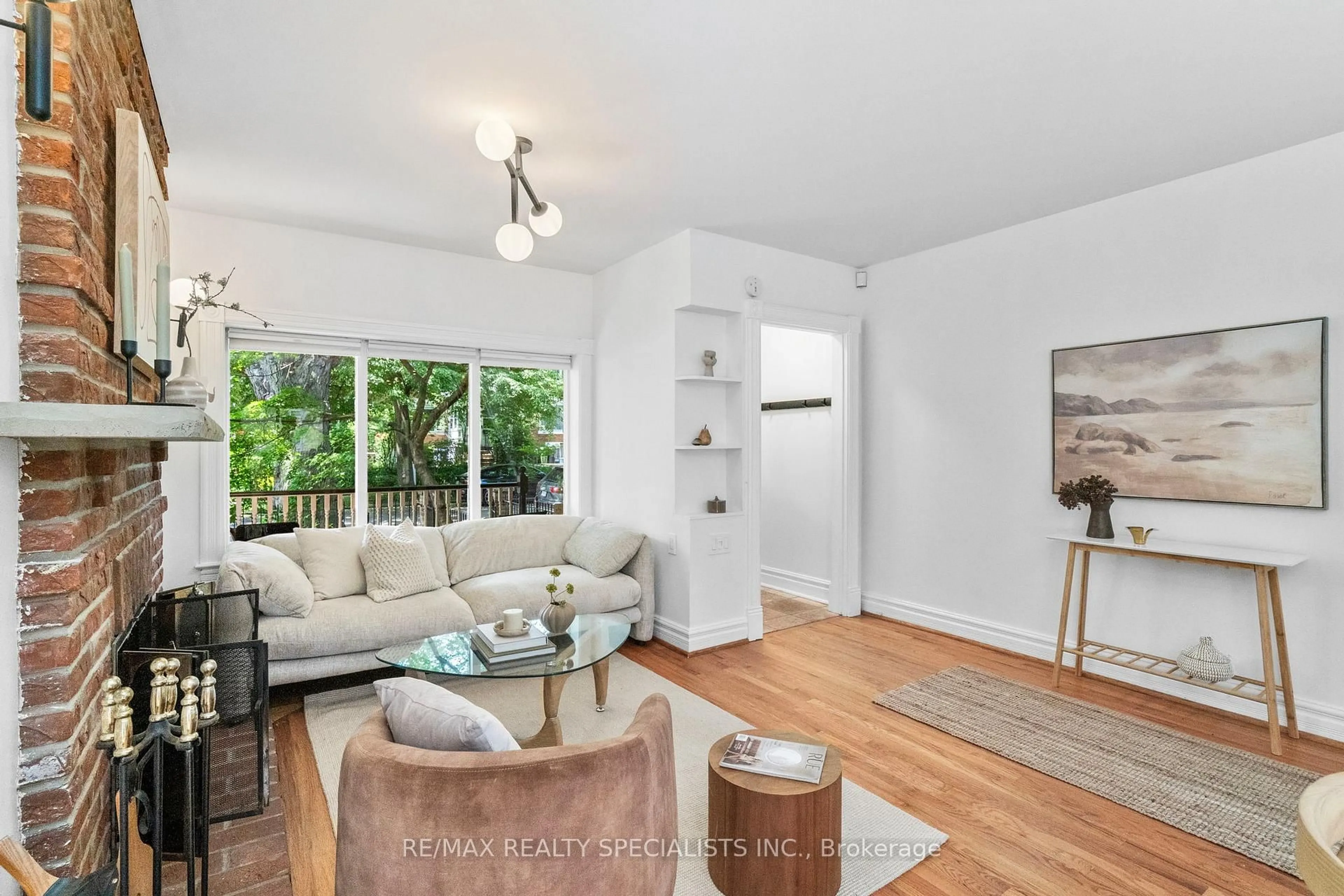 Living room with furniture, unknown for 117 Alton Ave, Toronto Ontario M4L 2M3