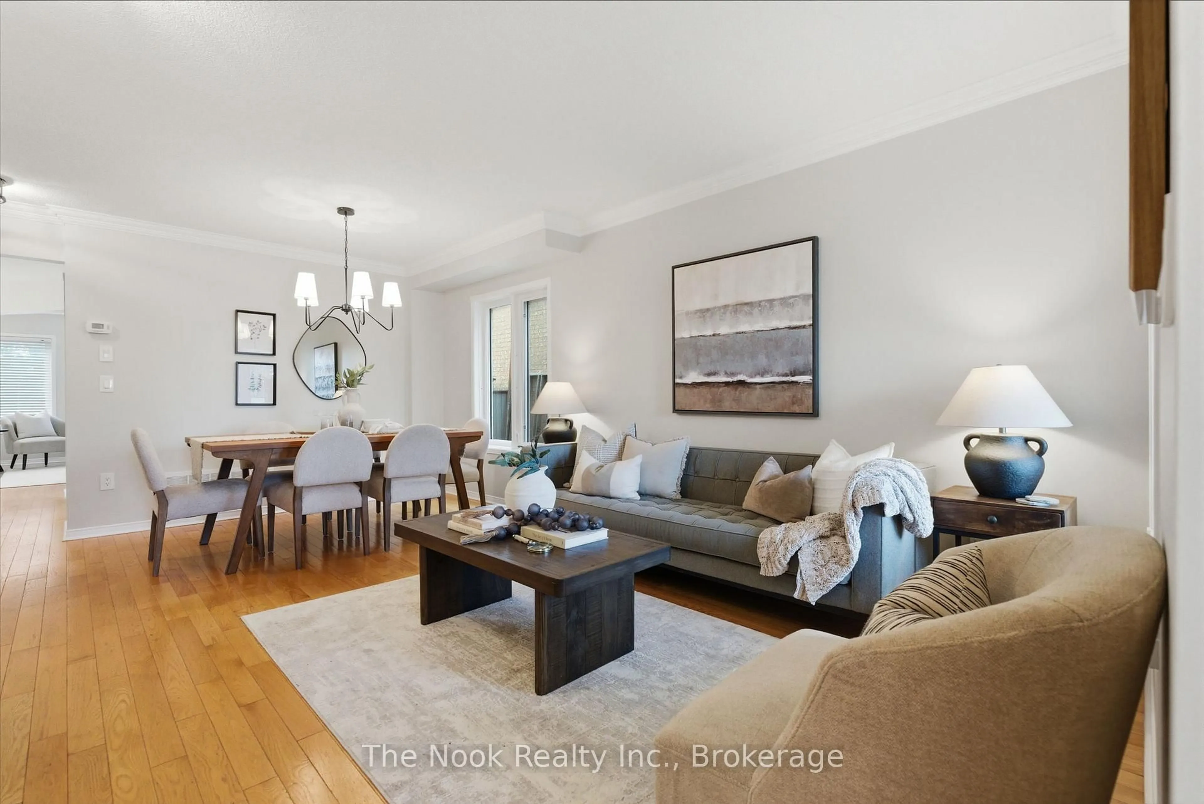 Living room with furniture, wood/laminate floor for 95 Ipswich Pl, Whitby Ontario L1M 2K2
