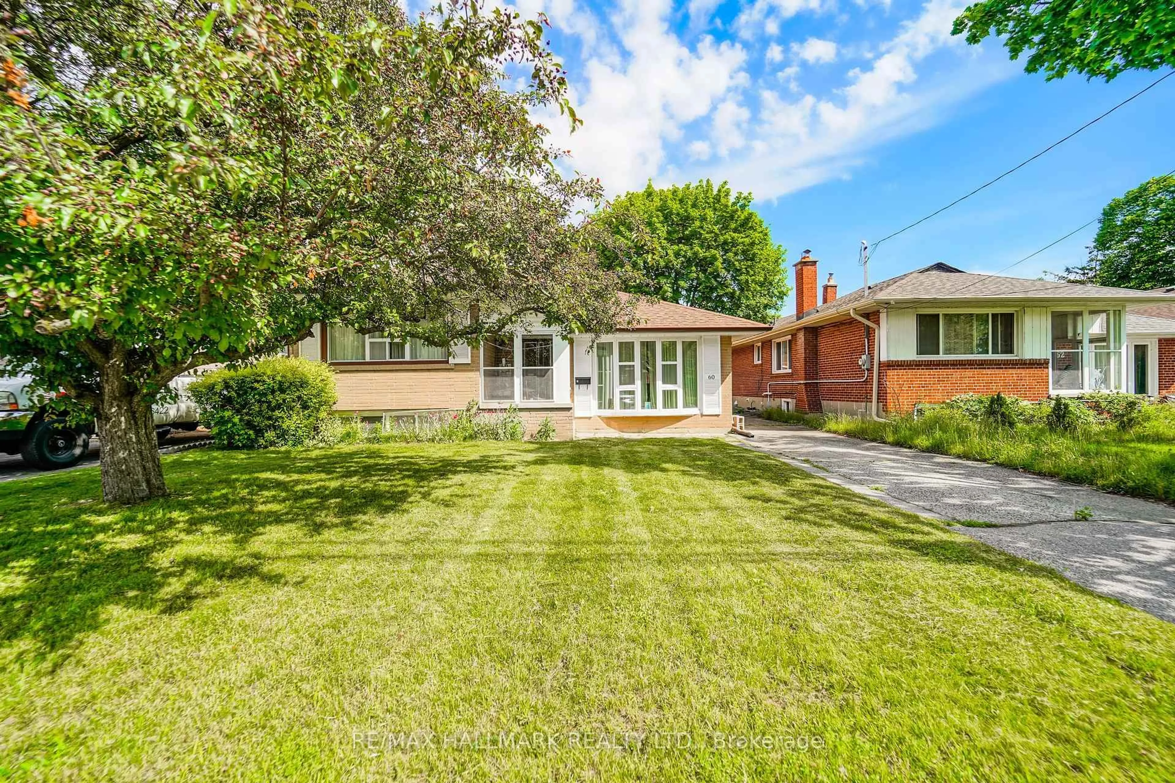 Home with brick exterior material, street for 60 Vradenberg Dr, Toronto Ontario M1T 1M6