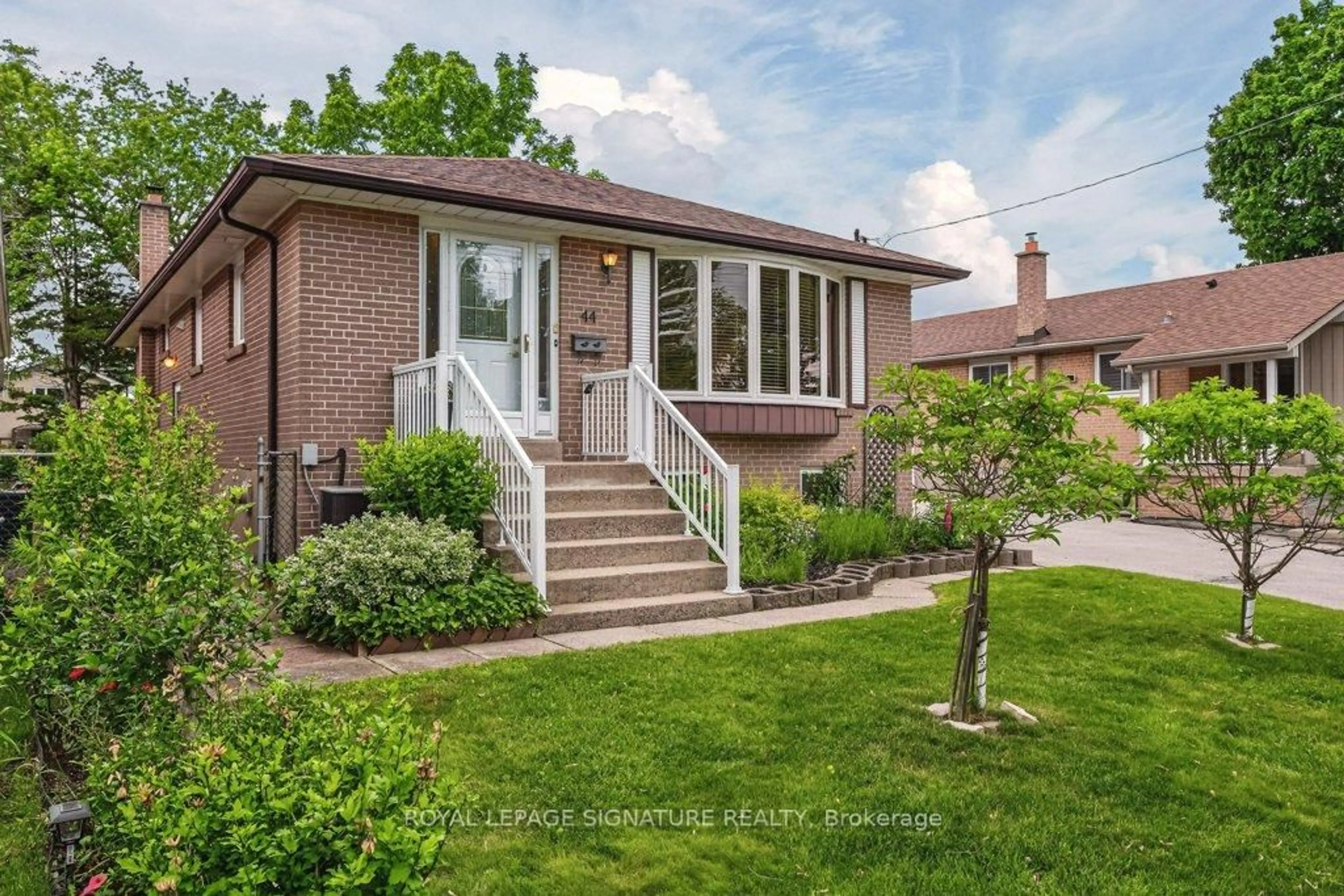 Home with brick exterior material, street for 44 Rowallan Dr, Toronto Ontario M1E 2Y6